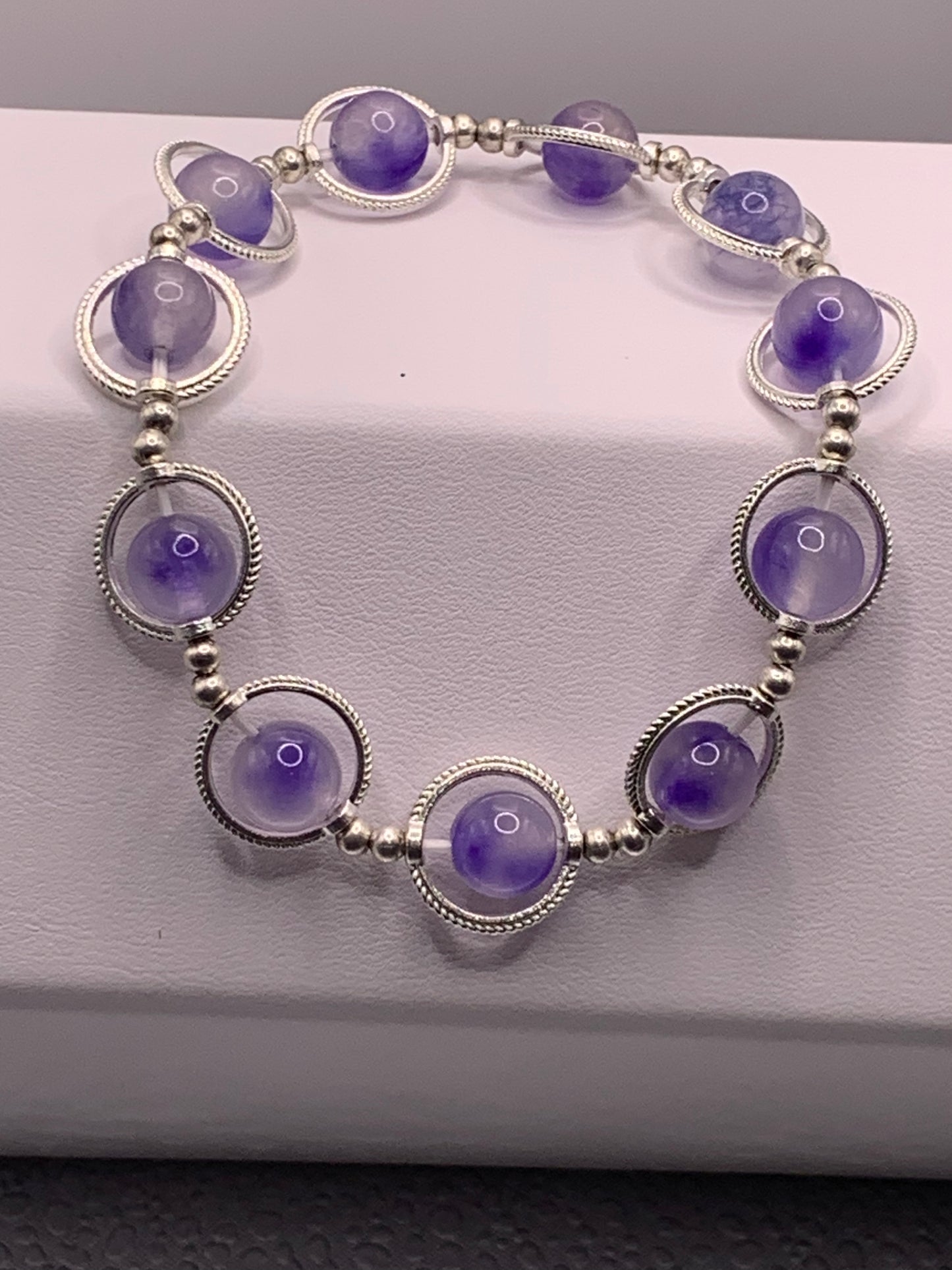 Ice blue agate semi precious stone/crystal elastic beaded bracelet with silver colored rings