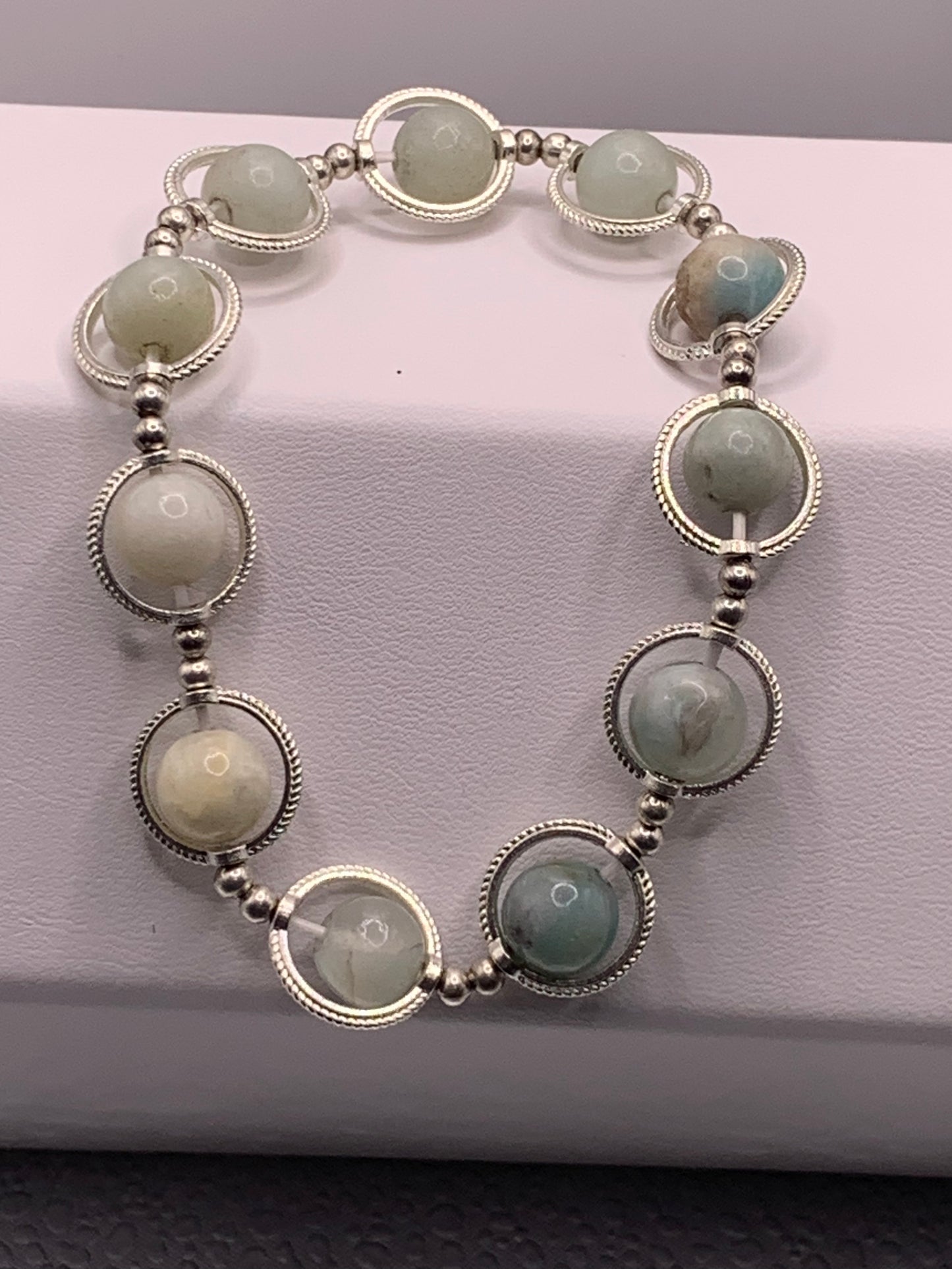 Amazonite semi precious stone/crystal elastic beaded bracelet with silver colored rings