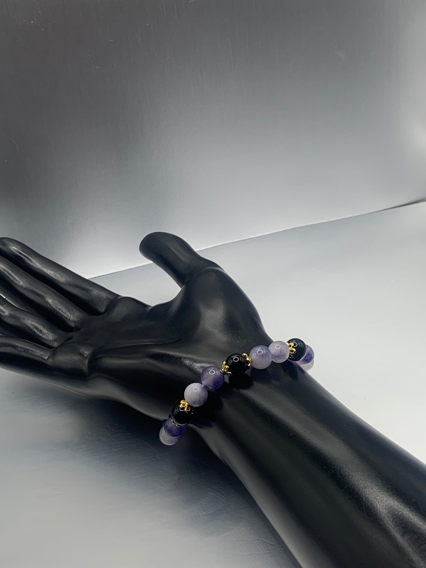 Black obsidian with ice blue agate semi precious stone/crystal beaded elastic bracelet with gold plated flower bead caps