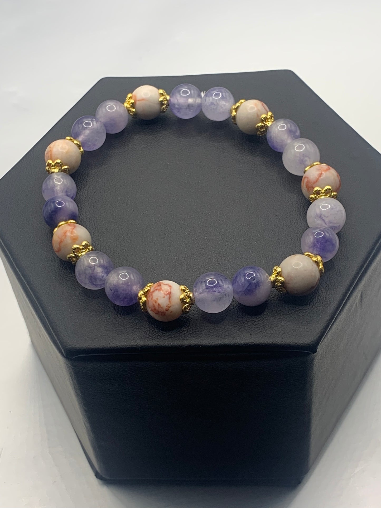 Red vein jasper and ice blue agate semi precious stone/crystal elastic beaded bracelet with gold plated flower bead caps