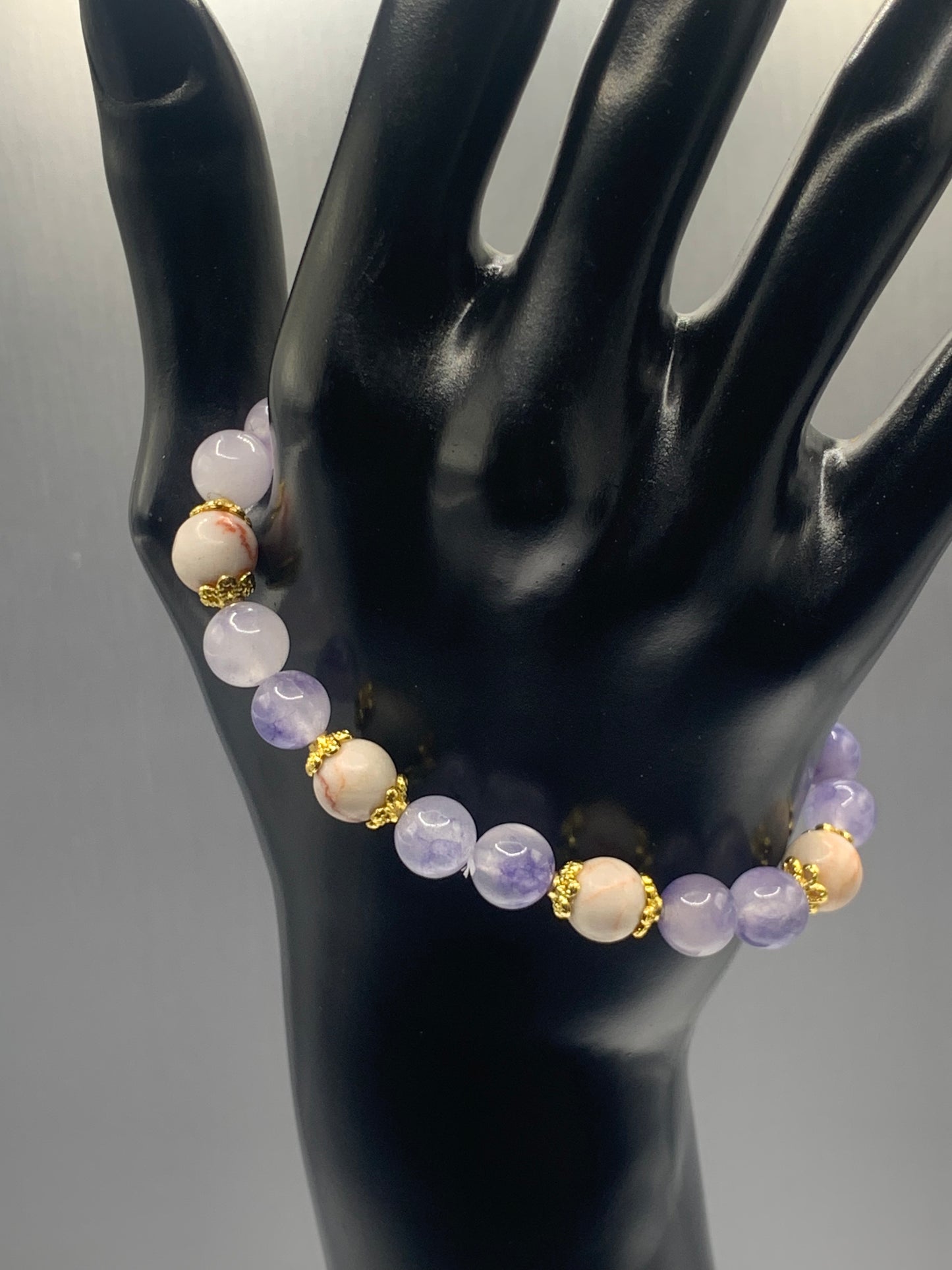 Red vein jasper and ice blue agate semi precious stone/crystal elastic beaded bracelet with gold plated flower bead caps