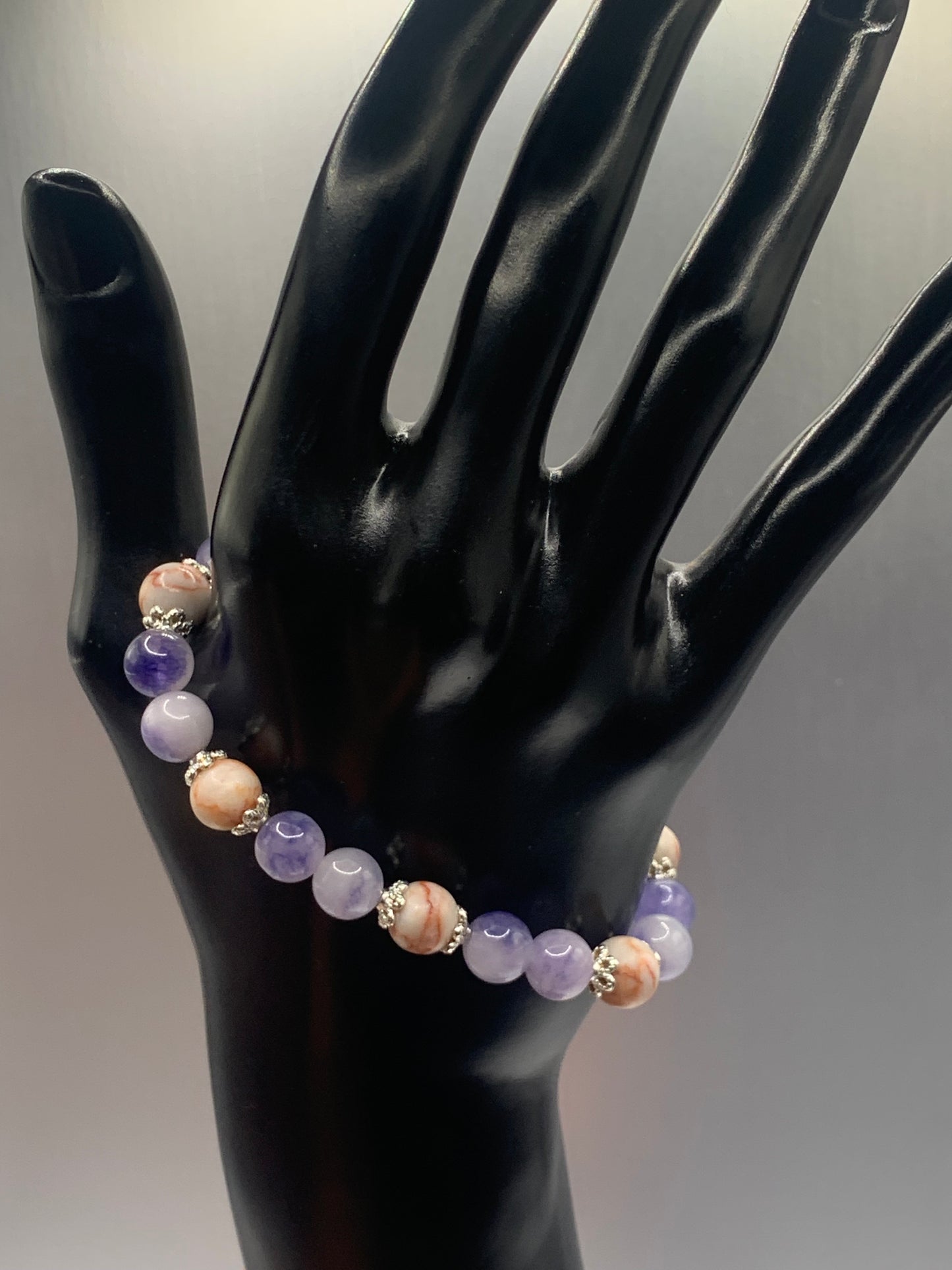 Red vein jasper and ice blue agate semi precious stone/crystal elastic beaded bracelet with silver plated flower bead caps