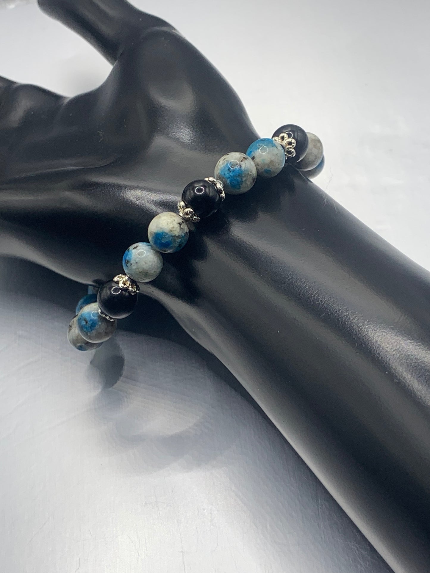 Black obsidian with k2 jasper semi precious stone/crystal beaded elastic bracelet with silver plated flower bead caps