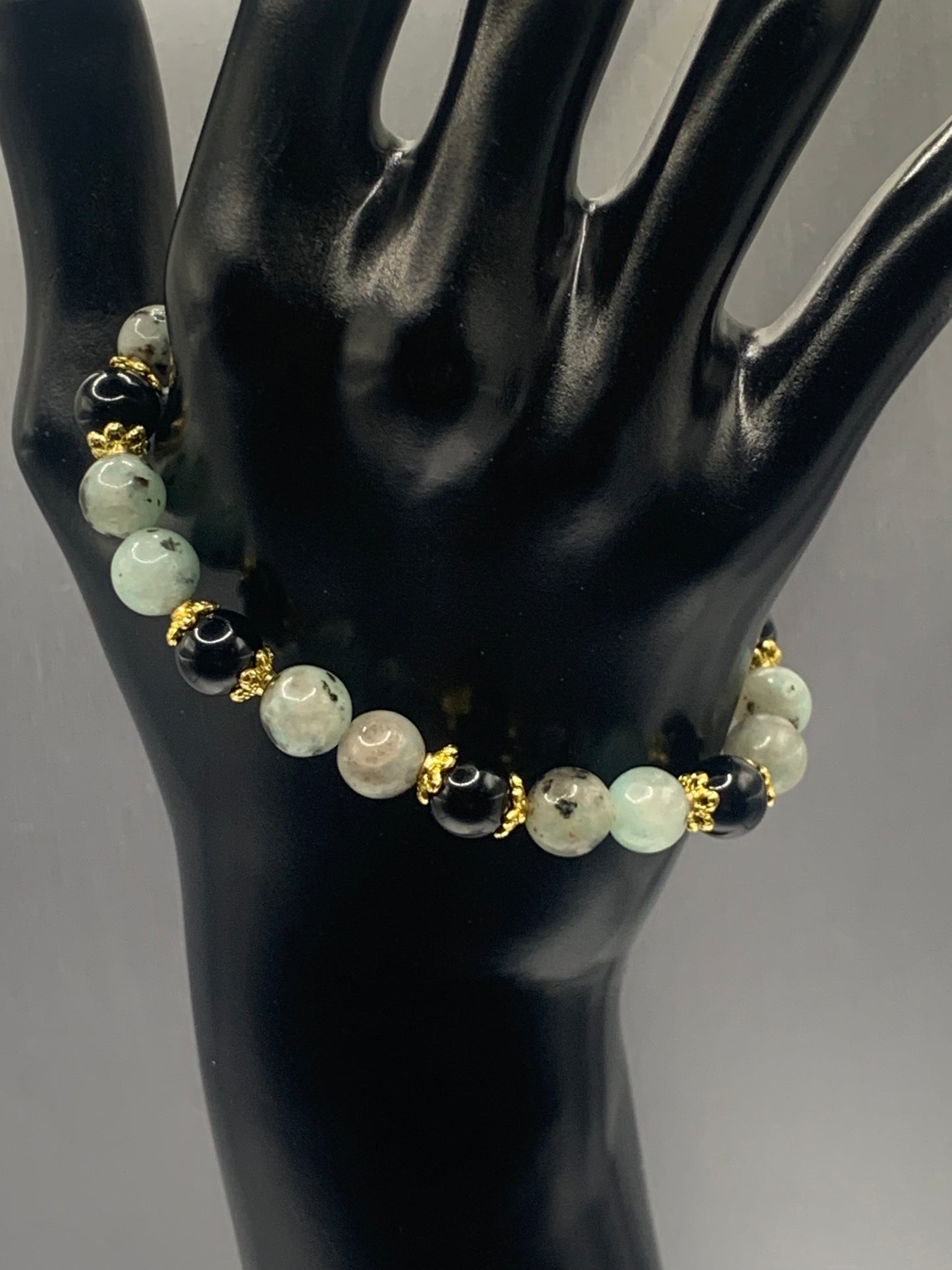 Black obsidian with kiwi jasper semi precious stone/crystal beaded elastic bracelet with gold plated flower bead caps