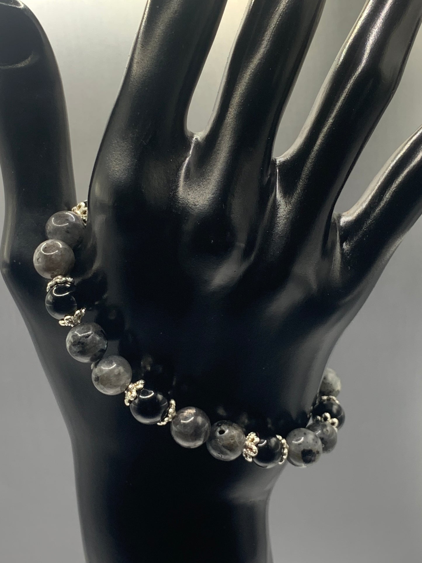 Black obsidian with larvikite semi precious stone/crystal beaded elastic bracelet with silver plated flower bead caps