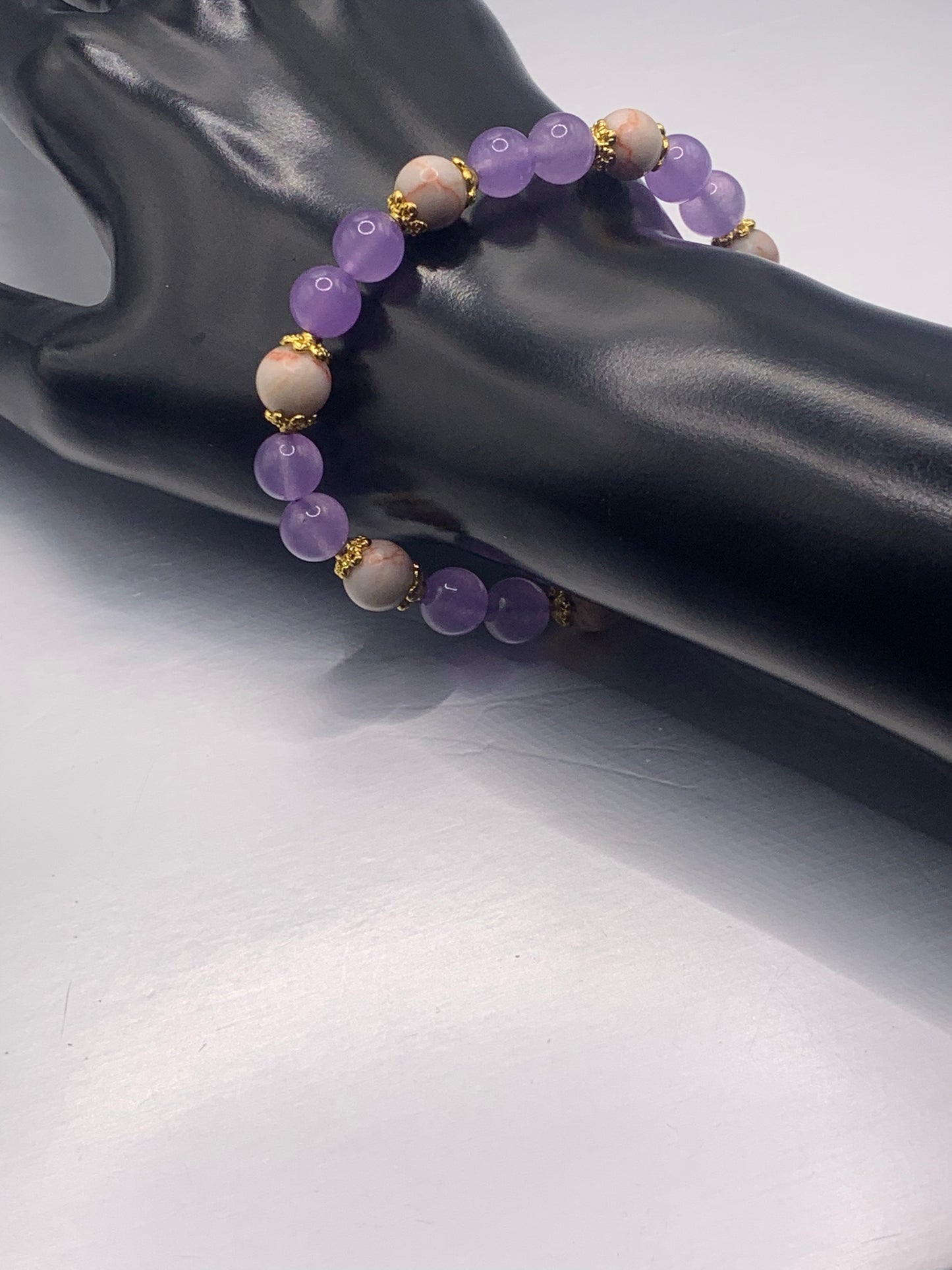 Red vein jasper and lavender agate semi precious stone/crystal elastic beaded bracelet with gold plated flower bead caps
