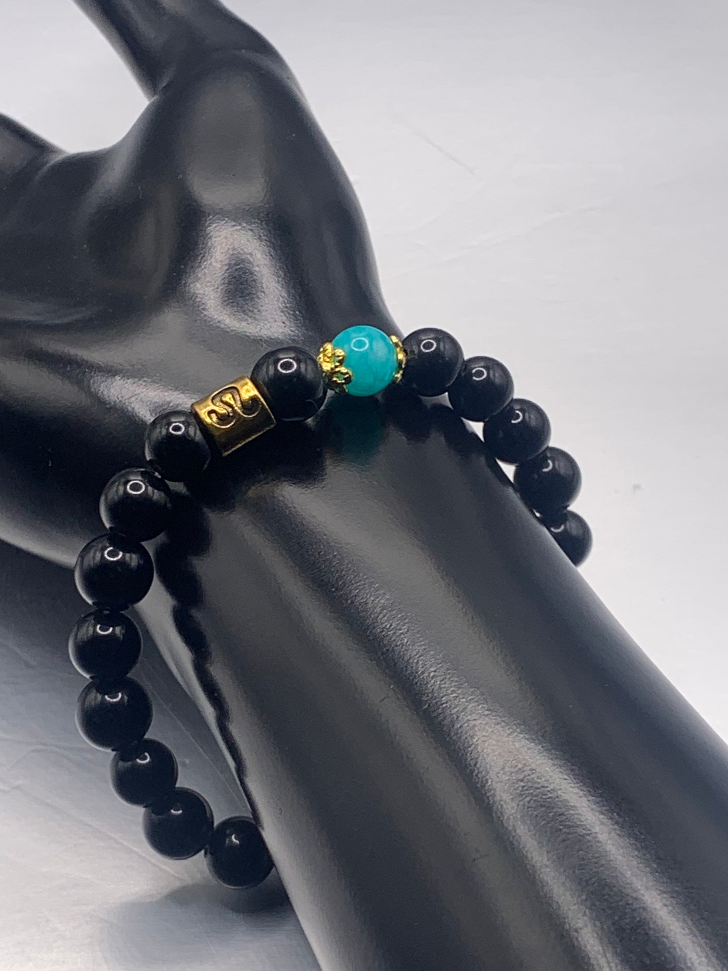Leo Zodiac black obsidian with aquamarine chalcedony elastic beaded bracelet with gold accents