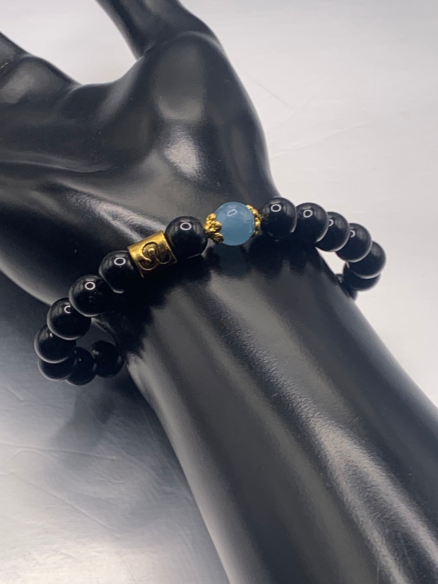 Leo Zodiac black obsidian with blue agate elastic beaded bracelet with gold accents