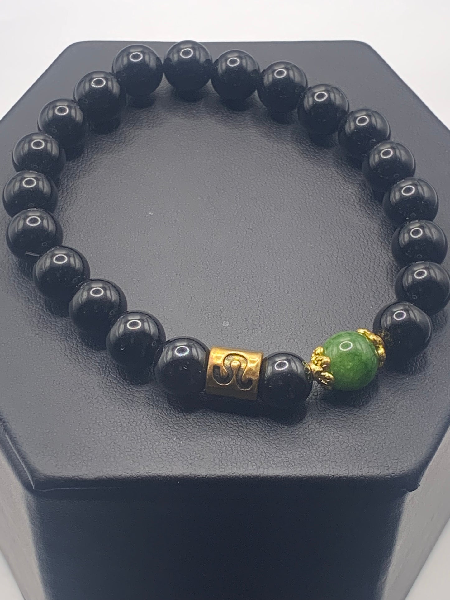 Leo Zodiac black obsidian with green tourmaline elastic beaded bracelet with gold accents