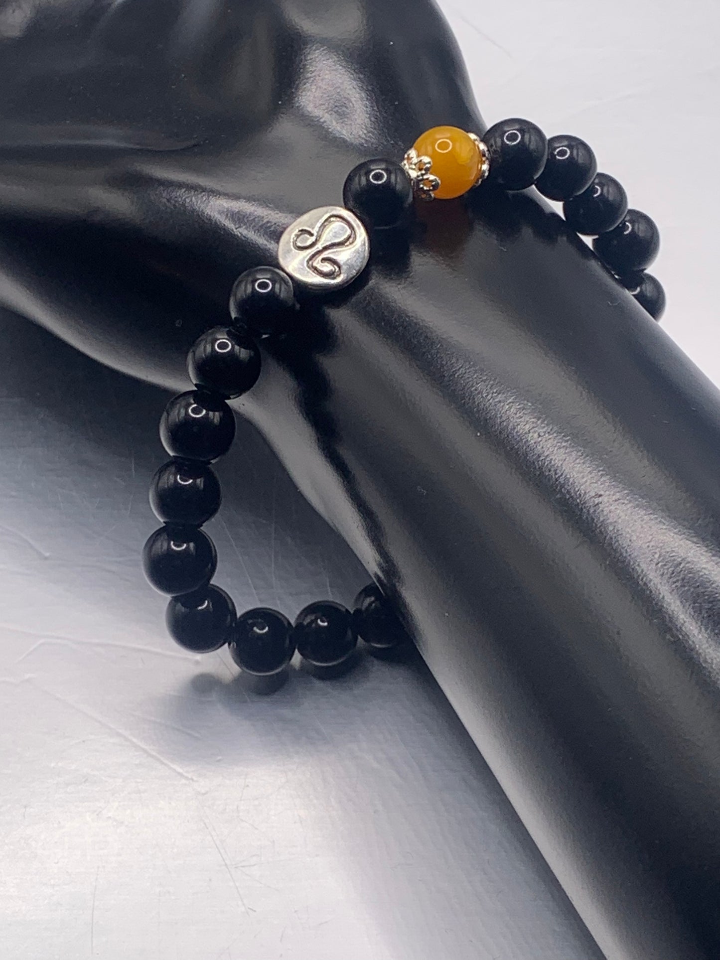 Leo Zodiac black obsidian with orange agate elastic beaded bracelet with silver accents