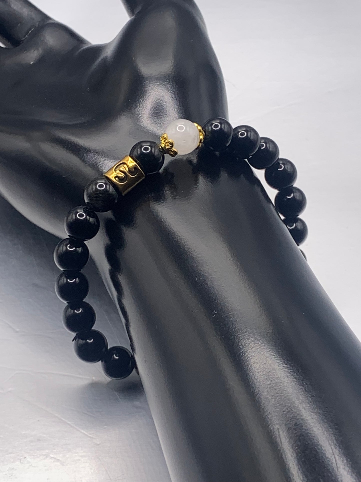 Leo Zodiac black obsidian with white chalcedony elastic beaded bracelet with gold accents