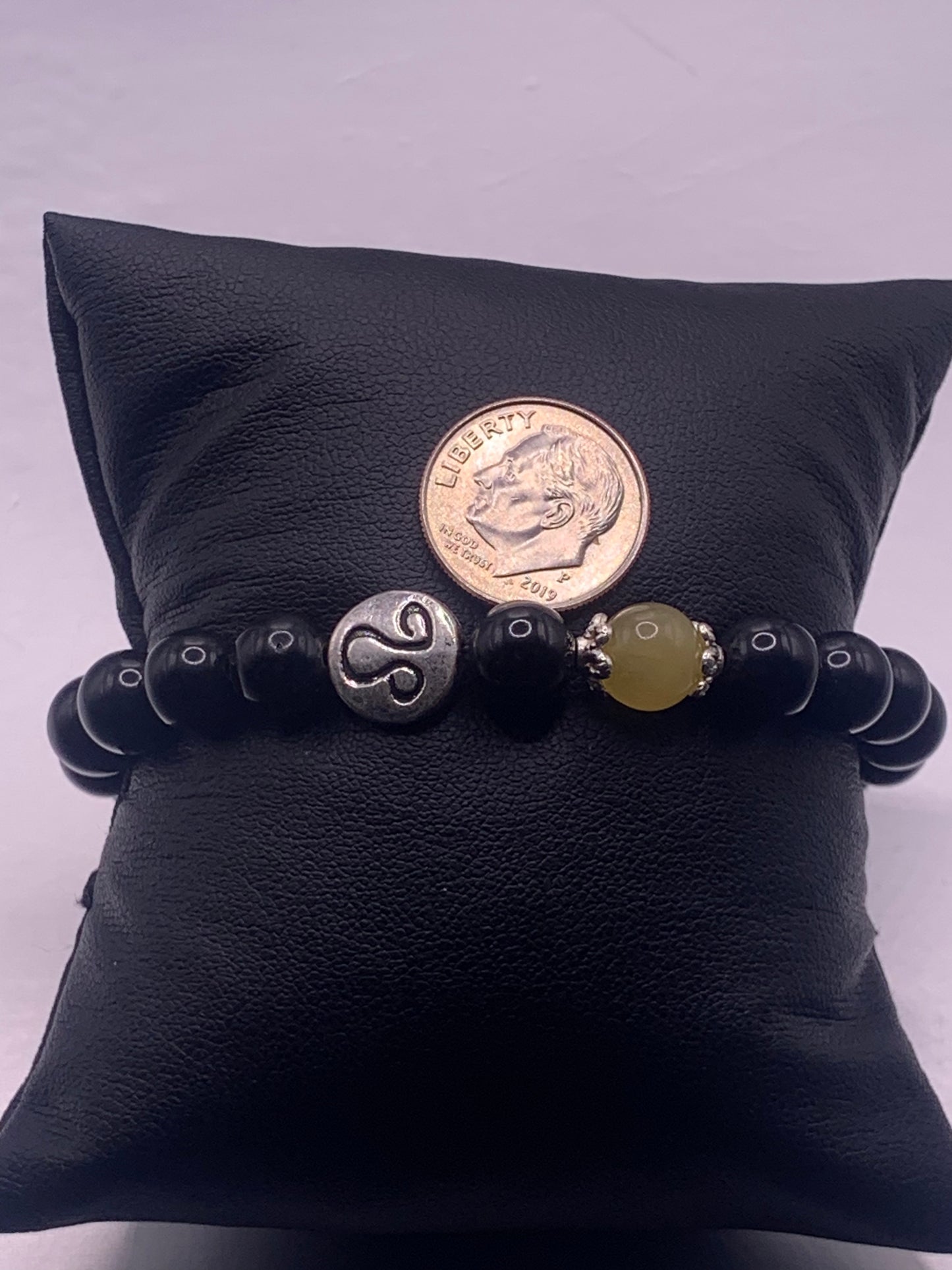 Leo Zodiac black obsidian with yellow agate elastic beaded bracelet with silver accents
