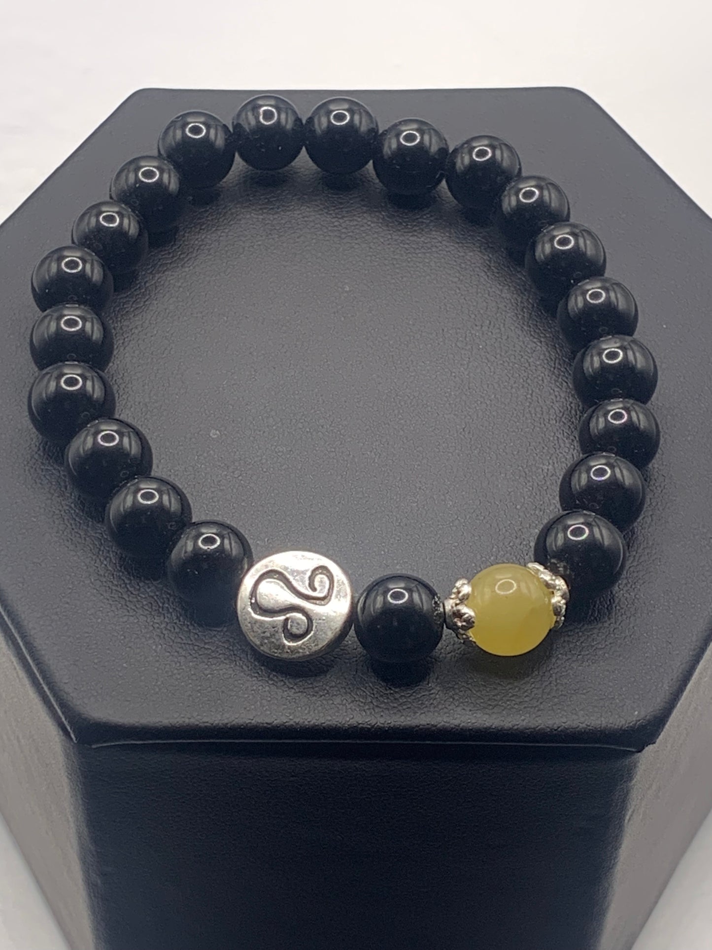 Leo Zodiac black obsidian with yellow agate elastic beaded bracelet with silver accents
