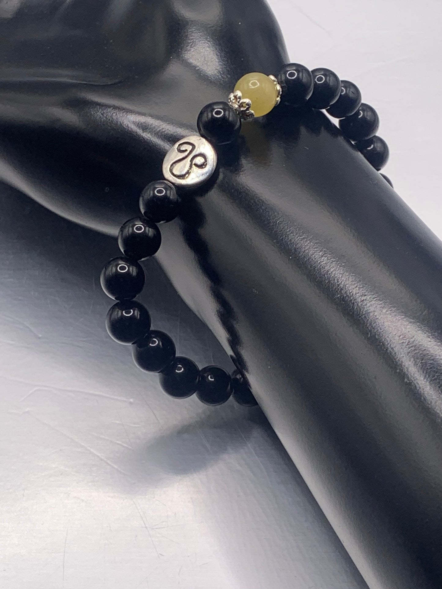 Leo Zodiac black obsidian with yellow agate elastic beaded bracelet with silver accents