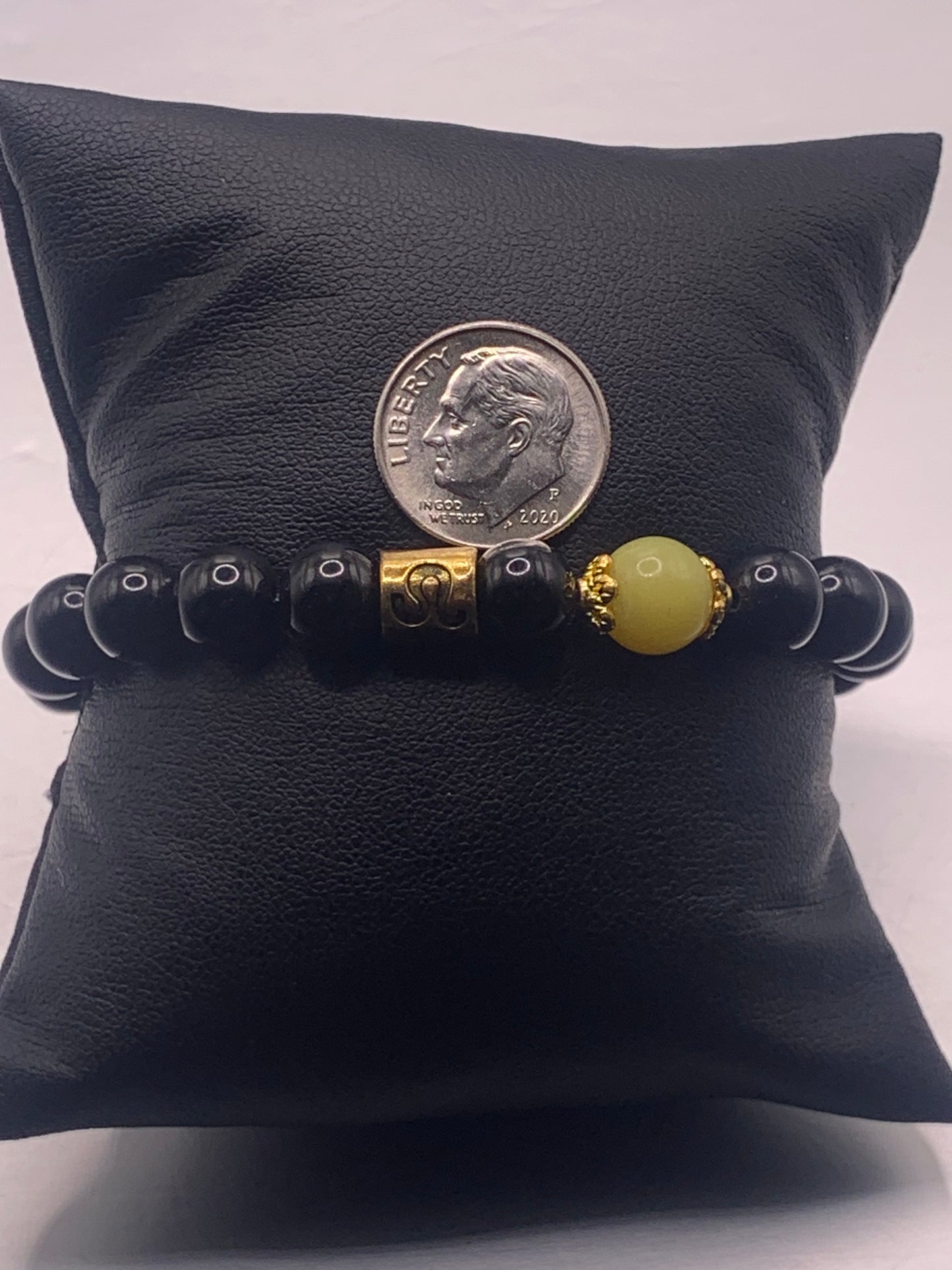 Leo Zodiac black obsidian with yellow jade elastic beaded bracelet with gold accents