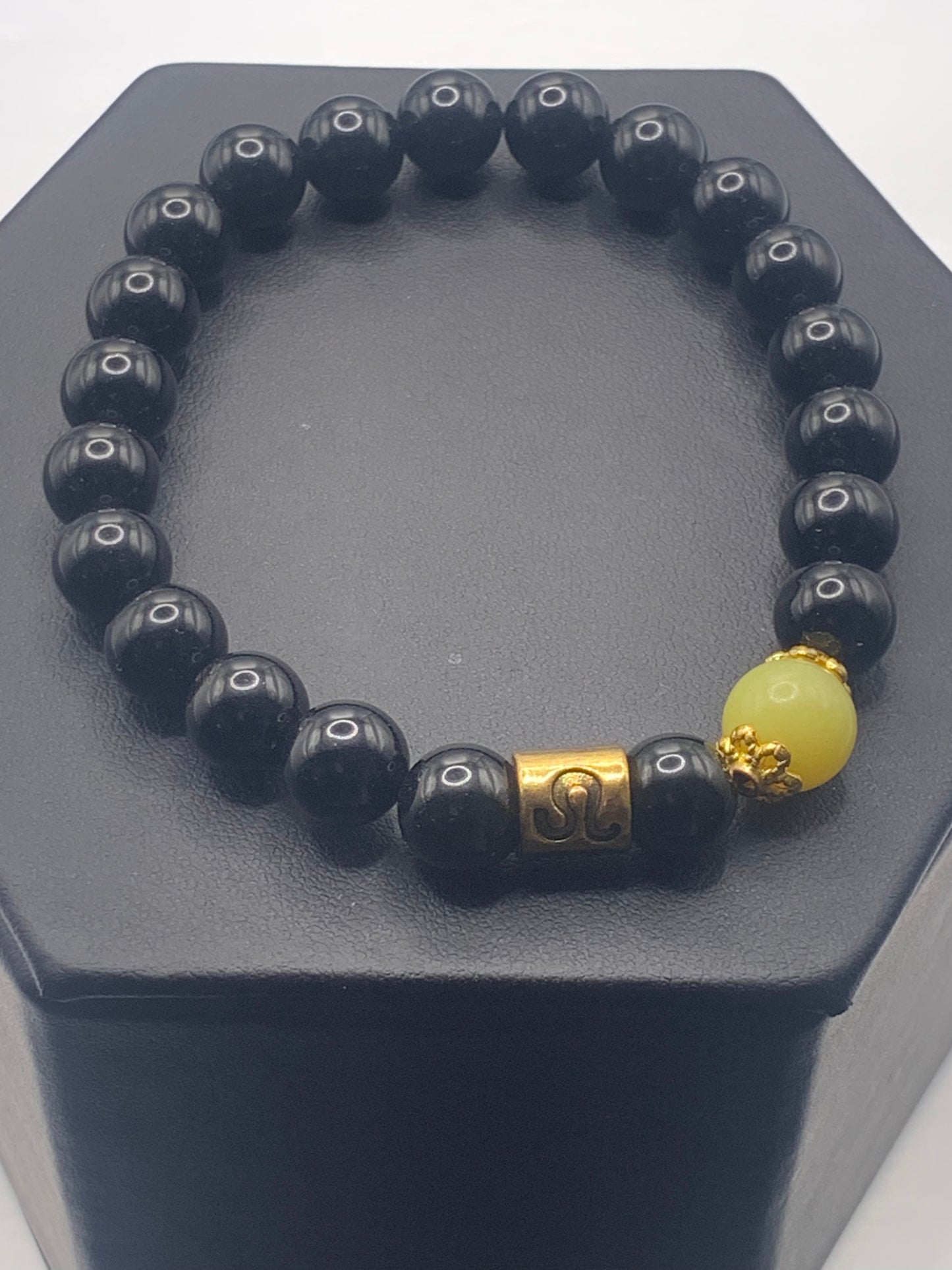 Leo Zodiac black obsidian with yellow jade elastic beaded bracelet with gold accents