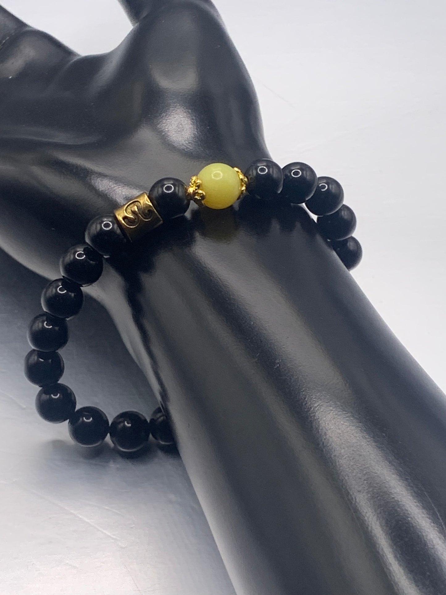 Leo Zodiac black obsidian with yellow jade elastic beaded bracelet with gold accents