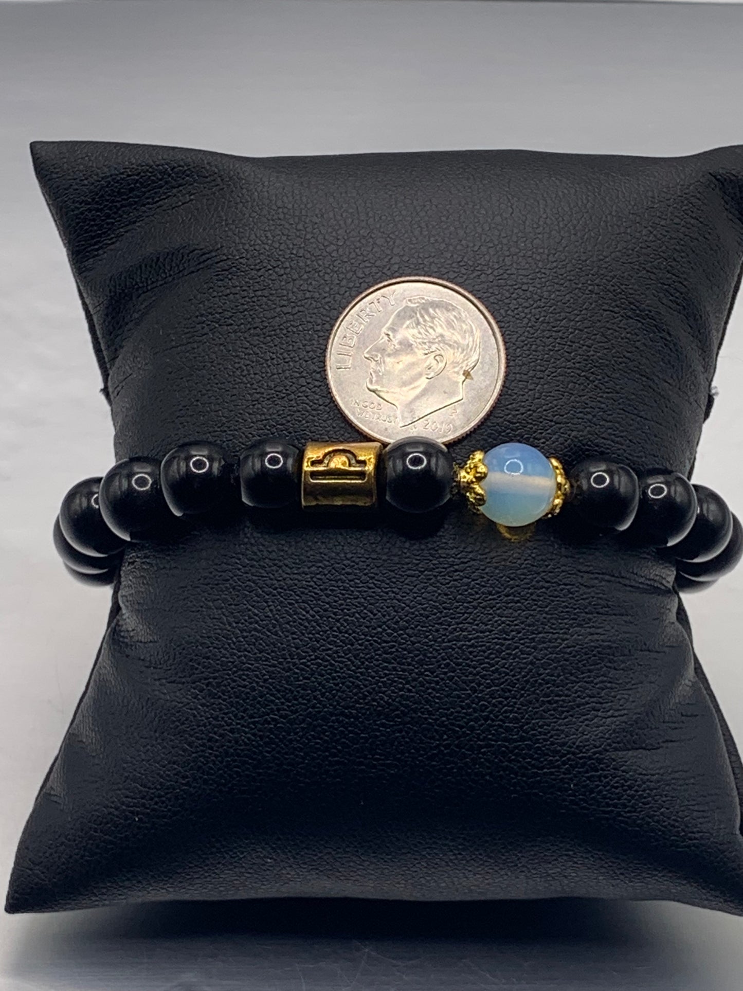 Libra (September 23 - October 22) Zodiac black obsidian with opalite elastic beaded bracelet with gold accents