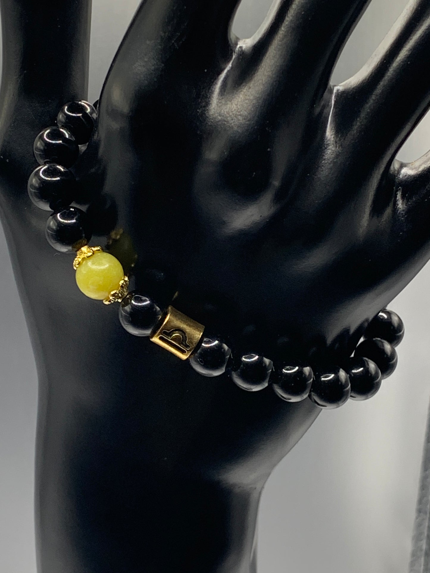 Libra Zodiac black obsidian with yellow jade elastic beaded bracelet with gold accents