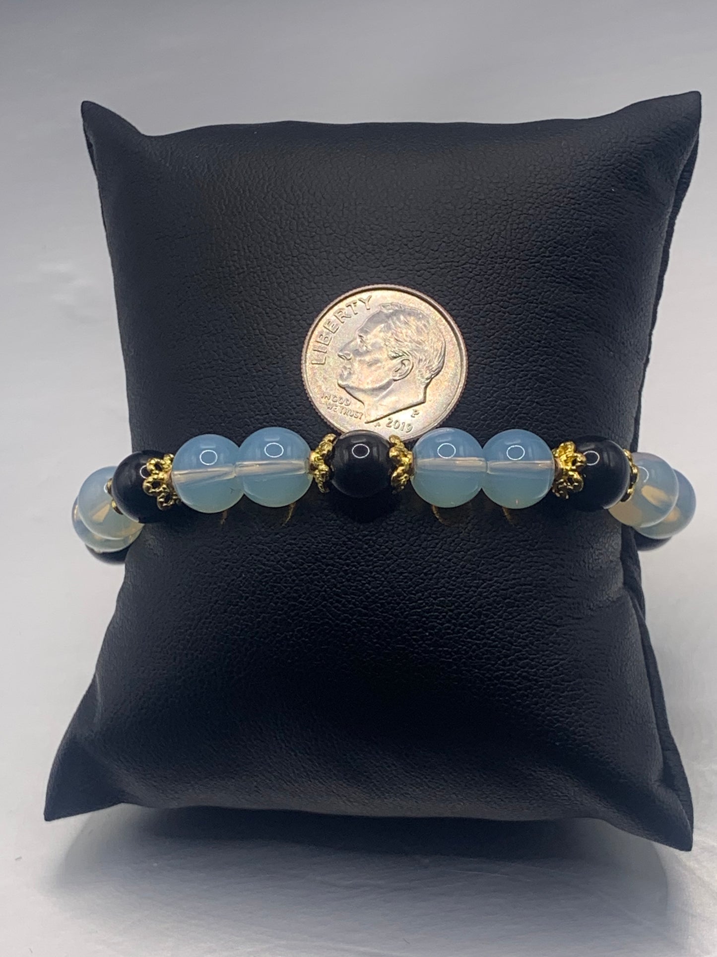 Black obsidian with opalite semi precious stone/crystal beaded elastic bracelet with gold plated flower bead caps