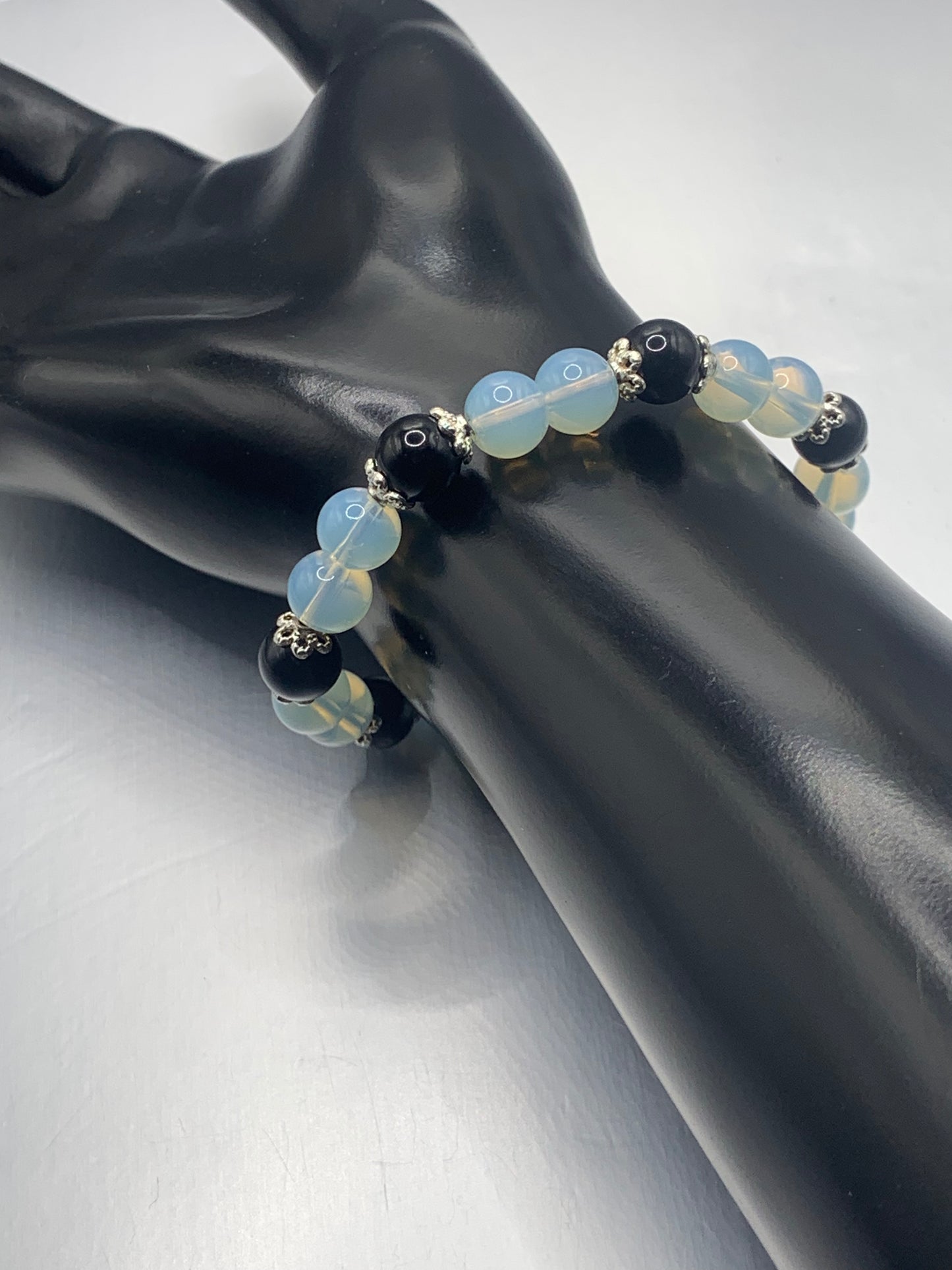 Black obsidian with opalite semi precious stone/crystal beaded elastic bracelet with silver plated flower bead caps