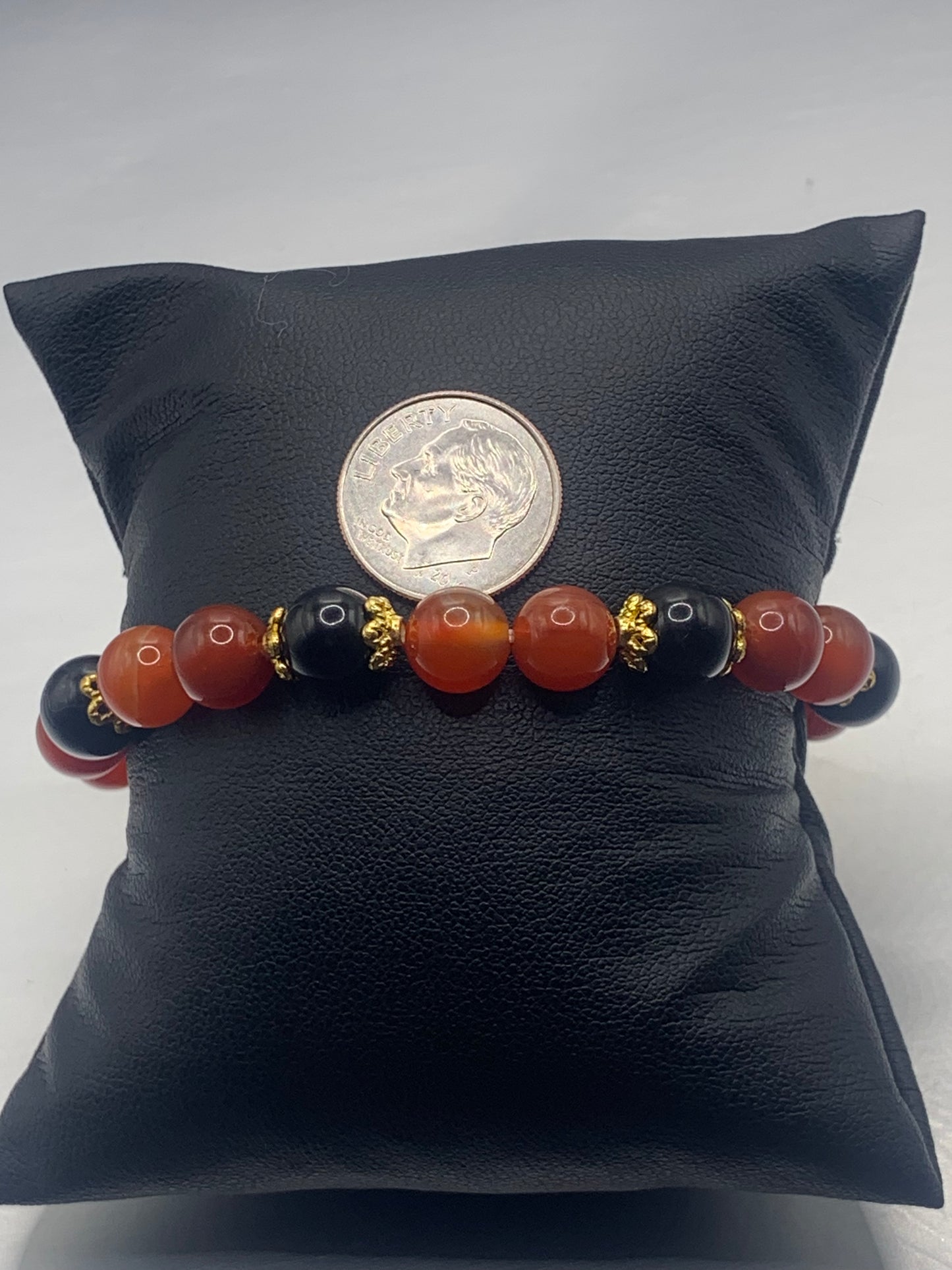 Black obsidian with orange agate semi precious stone/crystal beaded elastic bracelet with gold plated flower bead caps