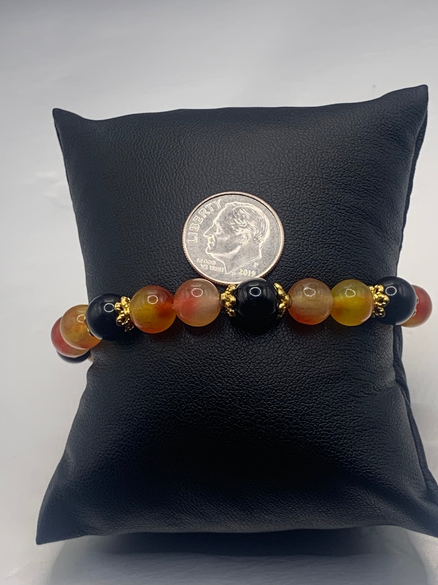 Black obsidian with orange blossom chalcedony semi precious stone/crystal beaded elastic bracelet with gold plated flower bead caps