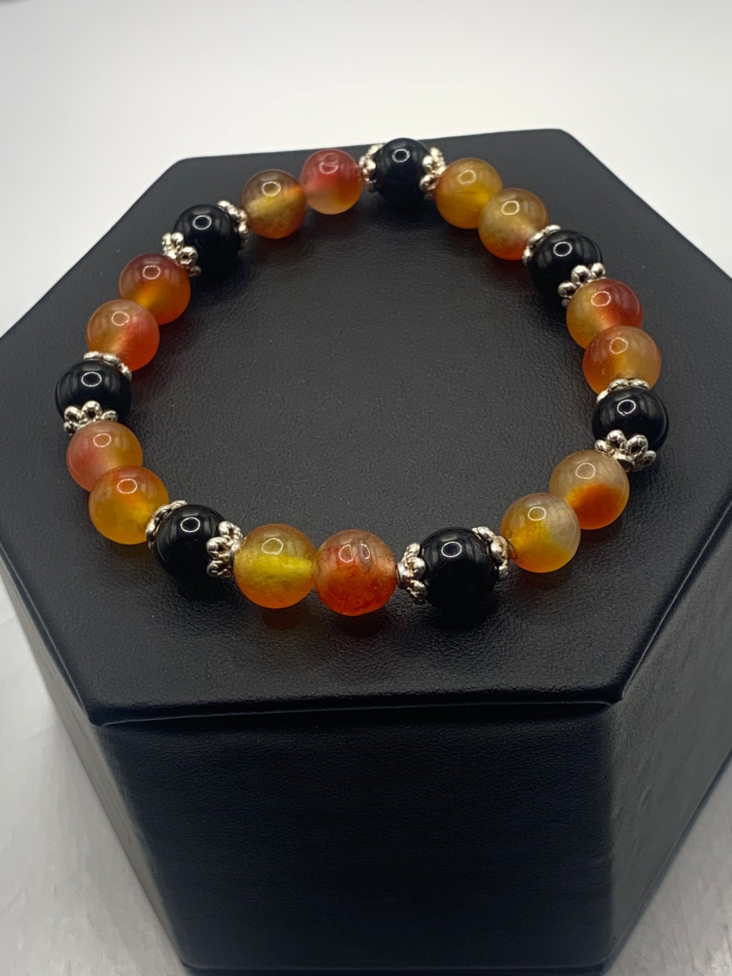 Black obsidian with orange blossom chalcedony semi precious stone/crystal beaded elastic bracelet with silver plated flower bead caps