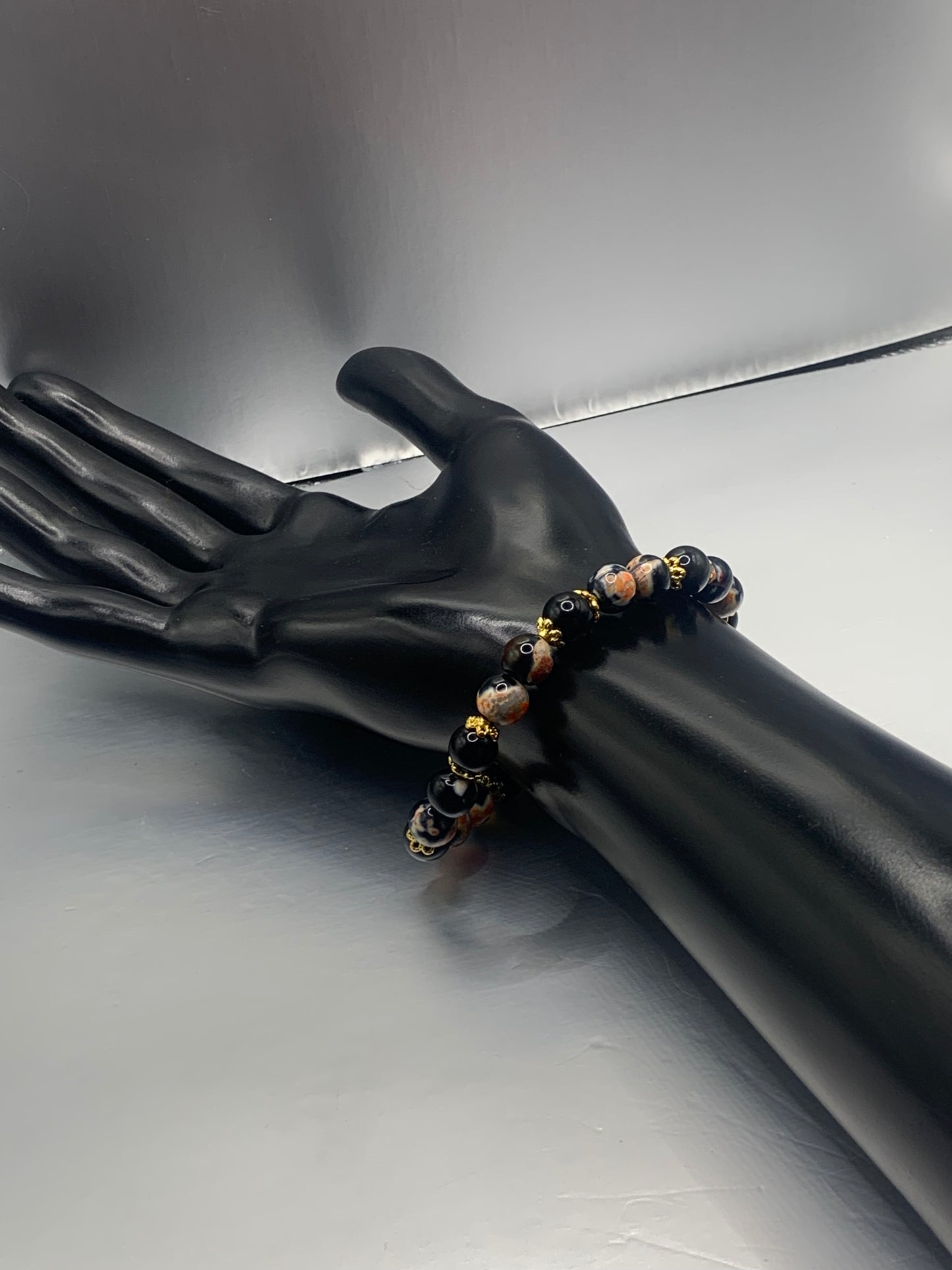 Black obsidian with orange orca agate semi precious stone/crystal beaded elastic bracelet with gold plated flower bead caps