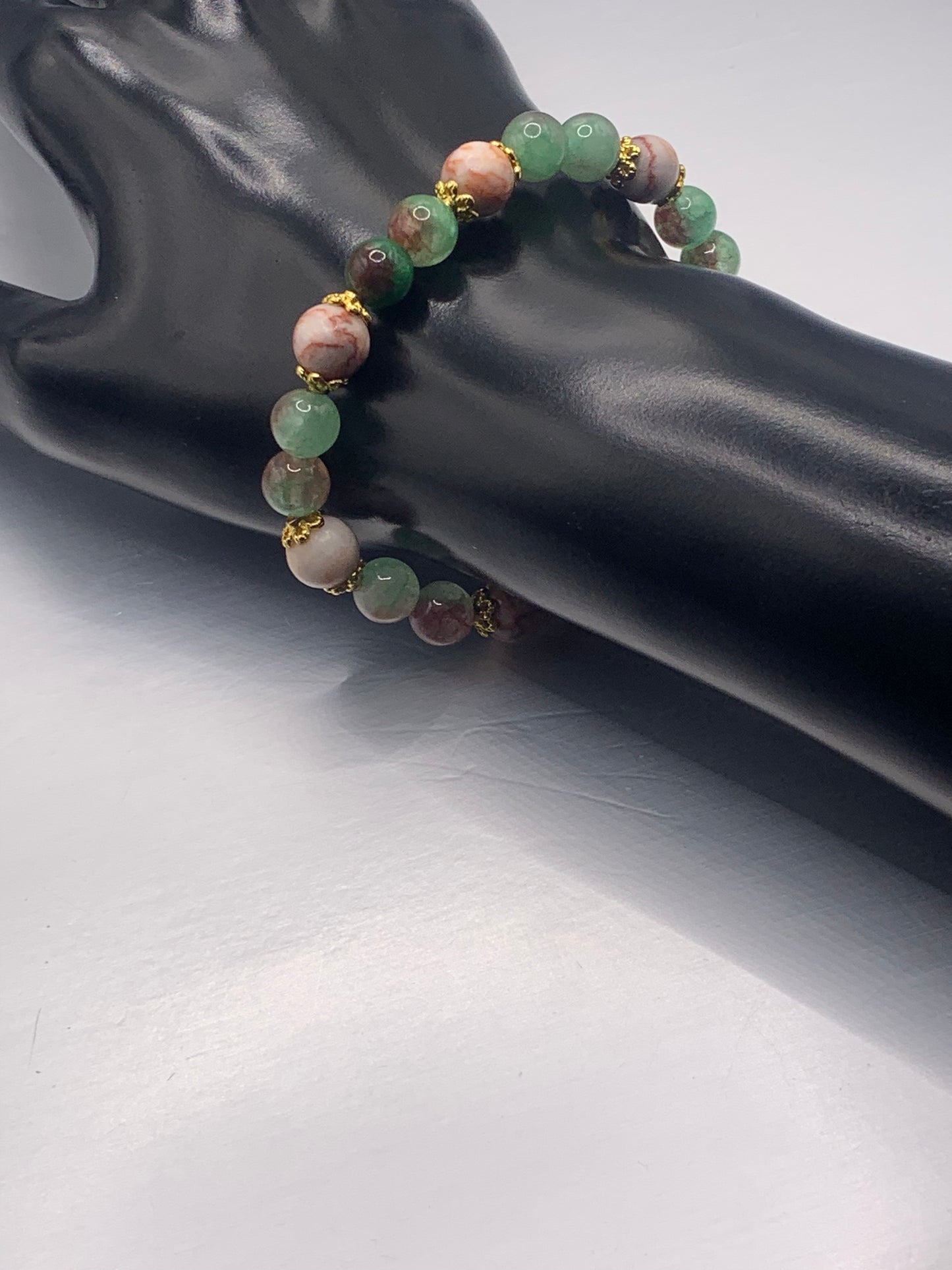 Red vein jasper and peacock chalcedony semi precious stone/crystal elastic beaded bracelet with gold plated flower bead caps
