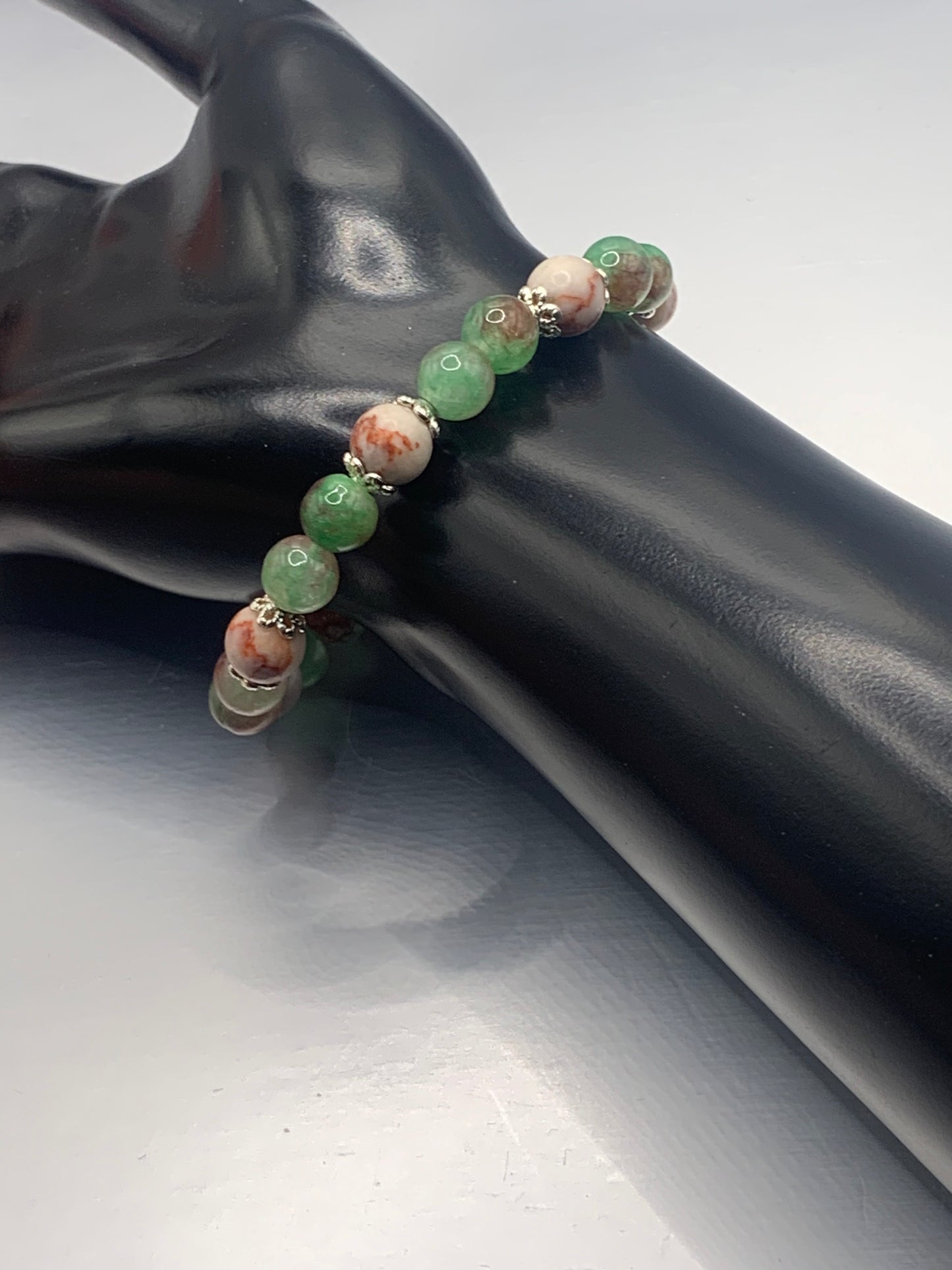 Red vein jasper and peacock chalcedony semi precious stone/crystal elastic beaded bracelet with silver plated flower bead caps