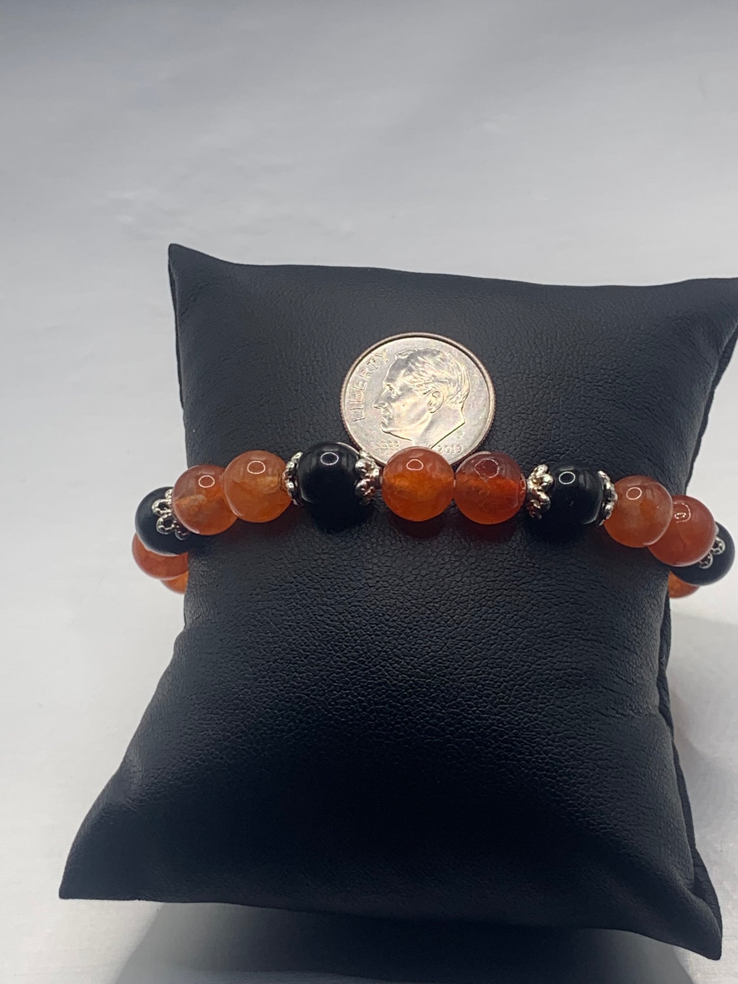 Black obsidian with phoenix agate semi precious stone/crystal beaded elastic bracelet with silver plated flower bead caps