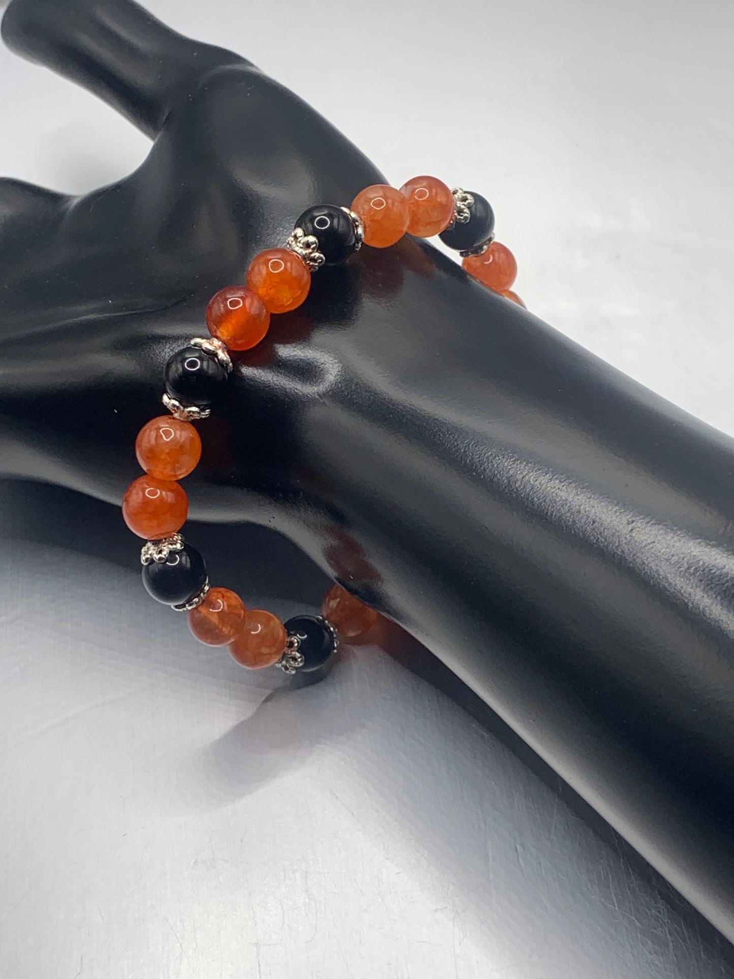 Black obsidian with phoenix agate semi precious stone/crystal beaded elastic bracelet with silver plated flower bead caps