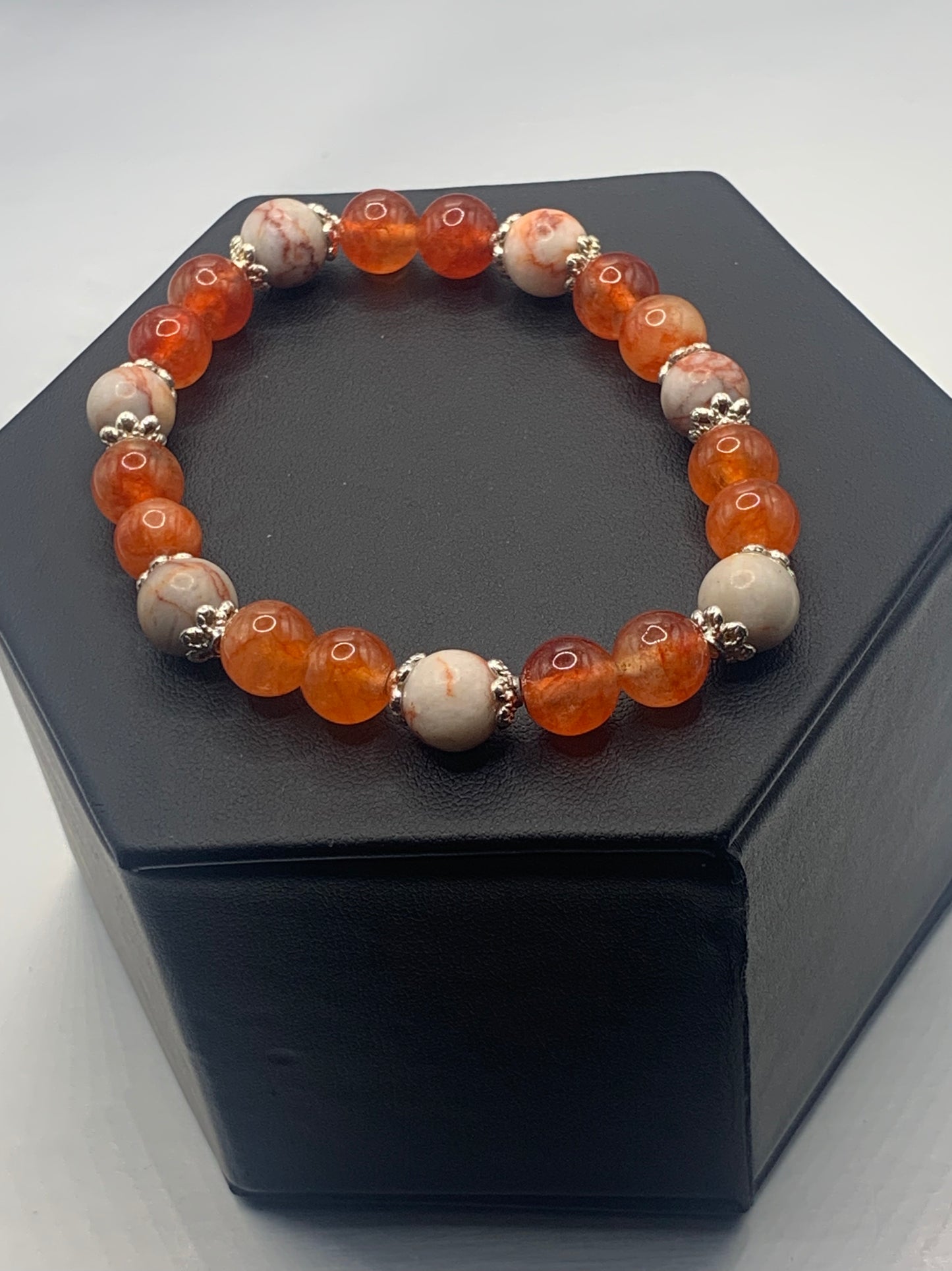 Red vein jasper and phoenix agate semi precious stone/crystal elastic beaded bracelet with silver plated flower bead caps