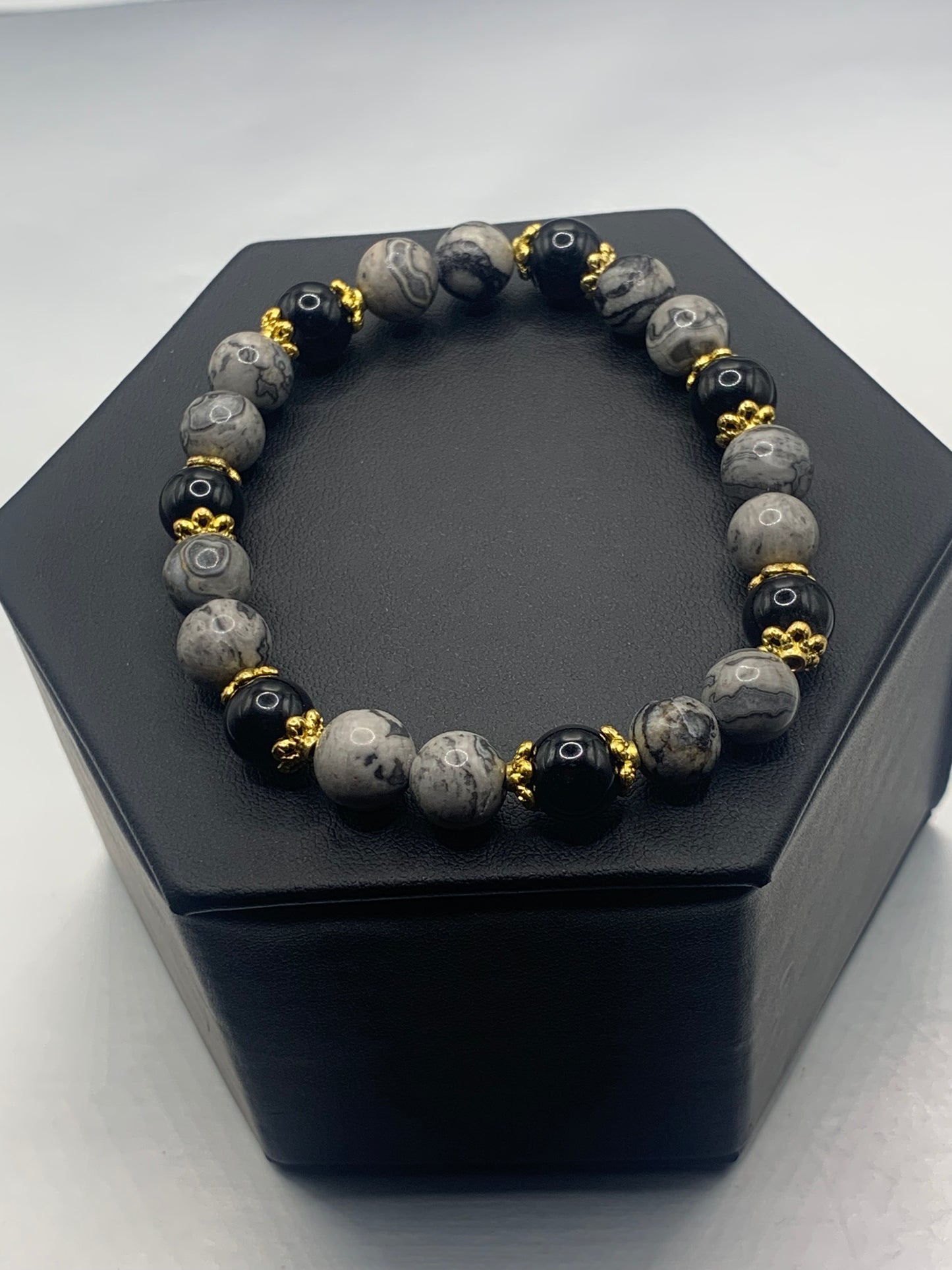 Black obsidian with picasso jasper semi precious stone/crystal beaded elastic bracelet with gold plated flower bead caps