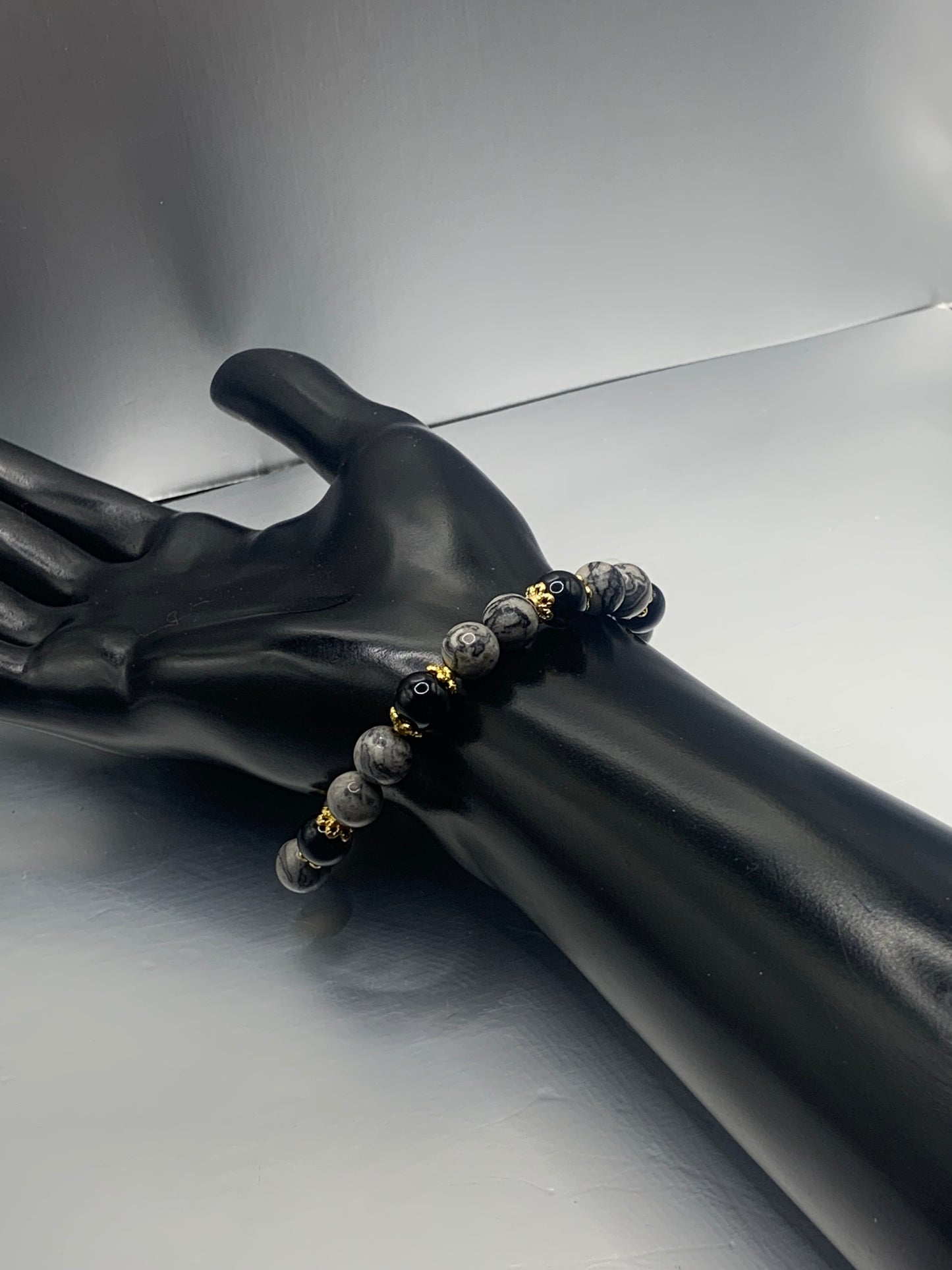 Black obsidian with picasso jasper semi precious stone/crystal beaded elastic bracelet with gold plated flower bead caps