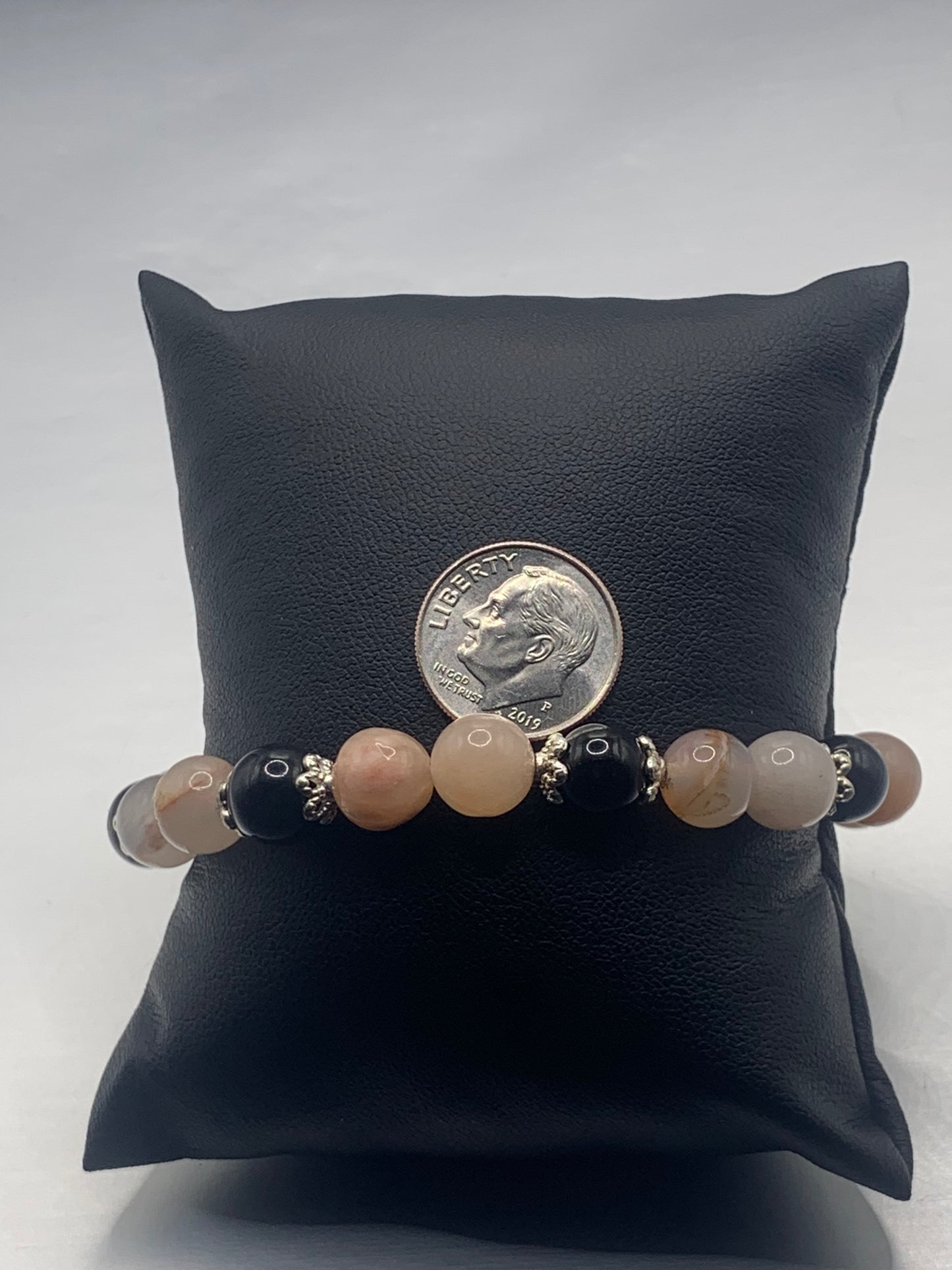 Black obsidian with pink aventurine semi precious stone/crystal beaded elastic bracelet with silver plated flower bead caps