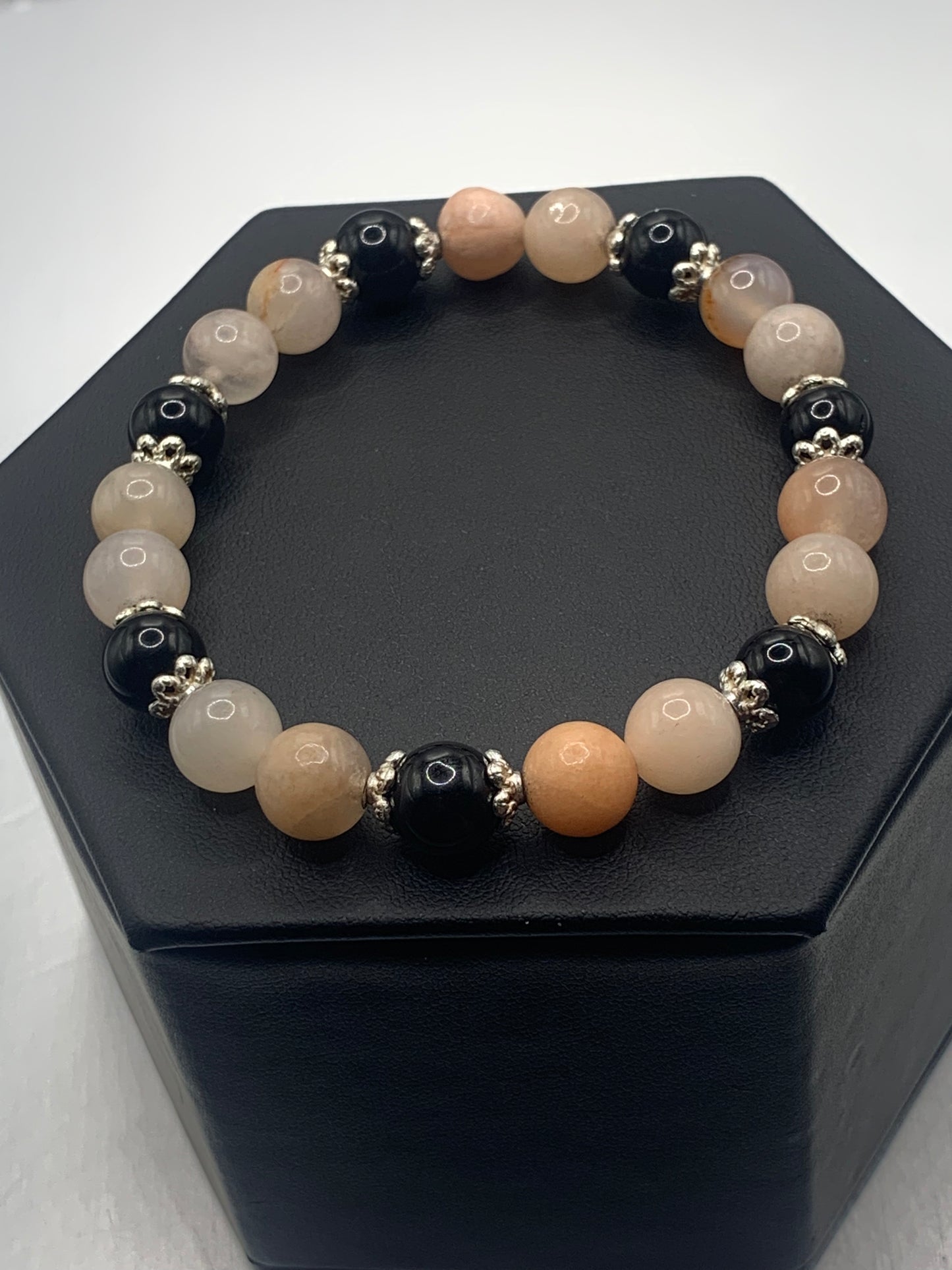 Black obsidian with pink aventurine semi precious stone/crystal beaded elastic bracelet with silver plated flower bead caps