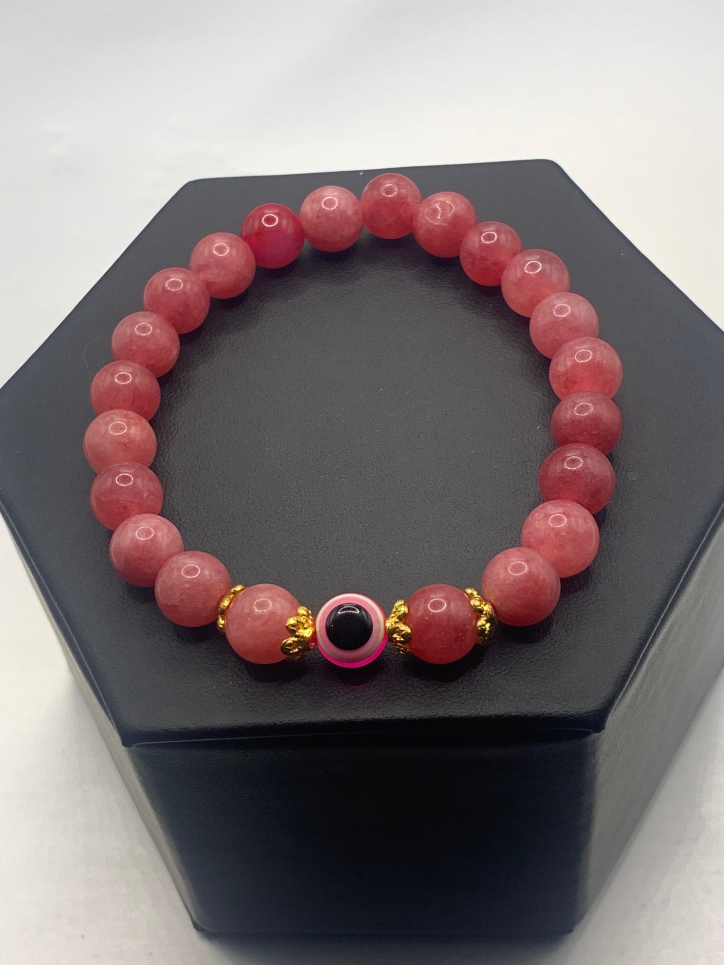 Pink chalcedony semi precious stone/crystal with resin evil eye beaded elastic bracelet