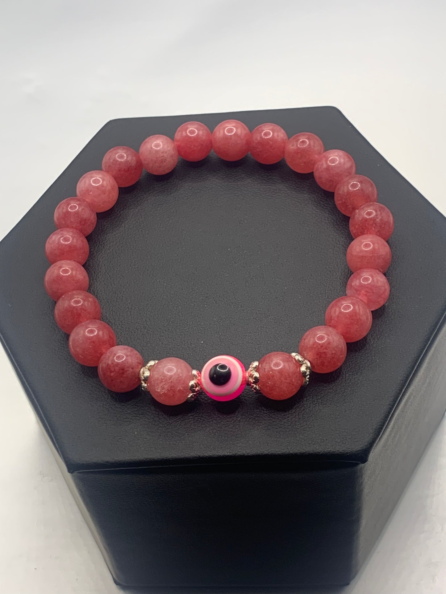 Pink chalcedony semi precious stone/crystal with resin evil eye beaded elastic bracelet