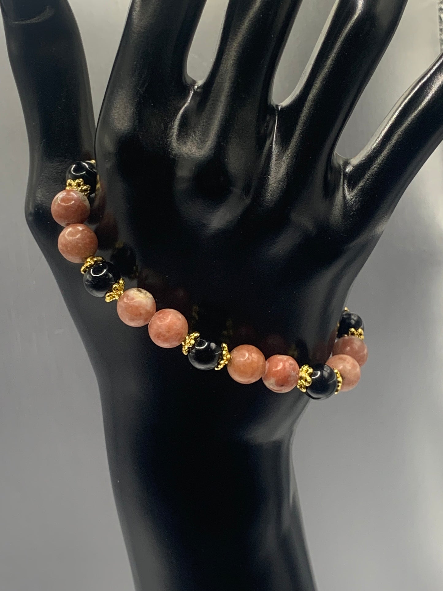 Black obsidian with pink lepidolite semi precious stone/crystal beaded elastic bracelet with gold plated flower bead caps