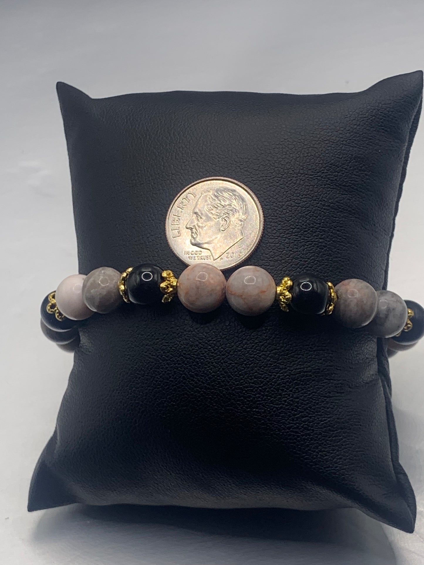 Black obsidian with pink zebra jasper semi precious stone/crystal beaded elastic bracelet with gold plated flower bead caps