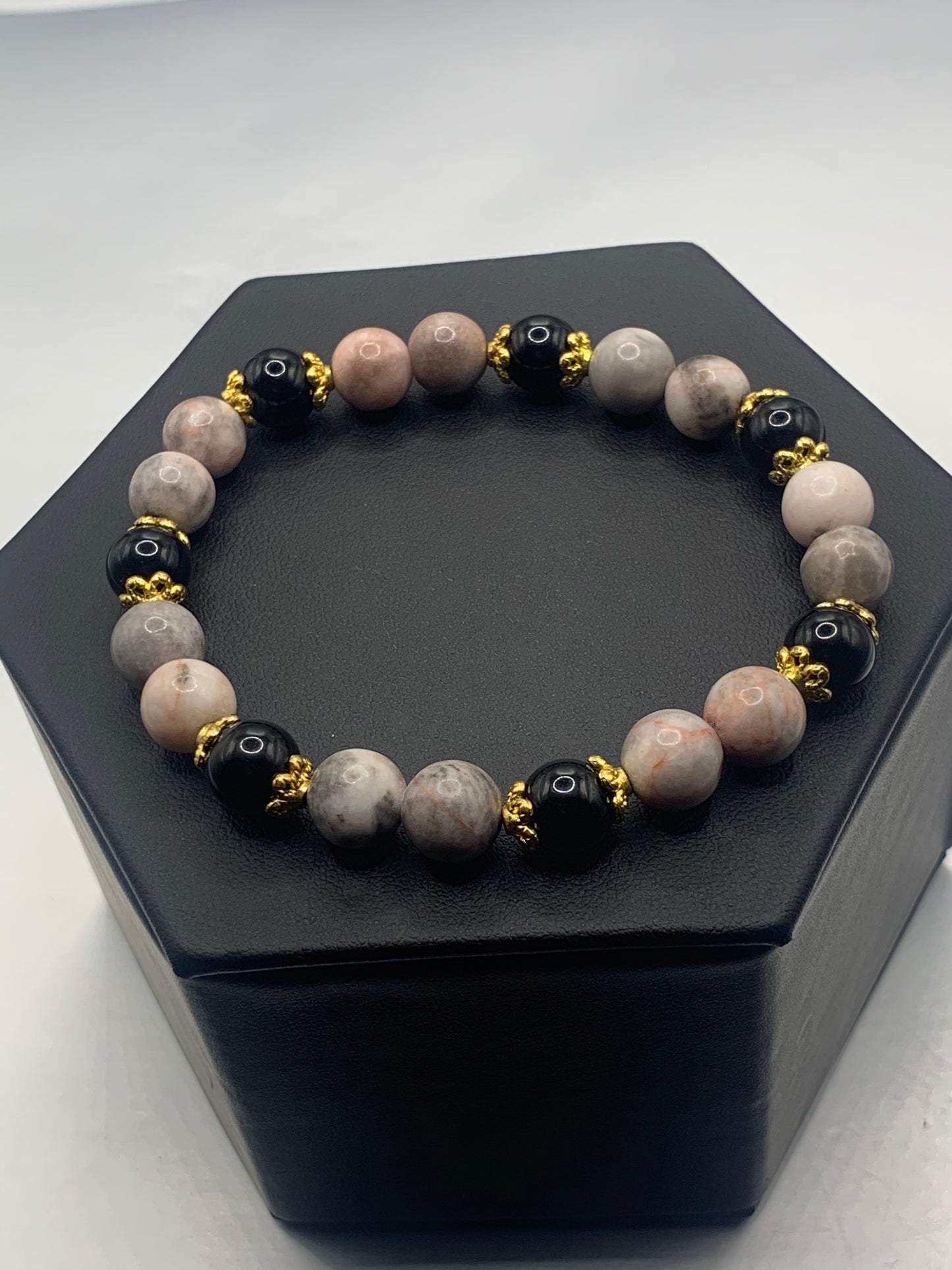 Black obsidian with pink zebra jasper semi precious stone/crystal beaded elastic bracelet with gold plated flower bead caps