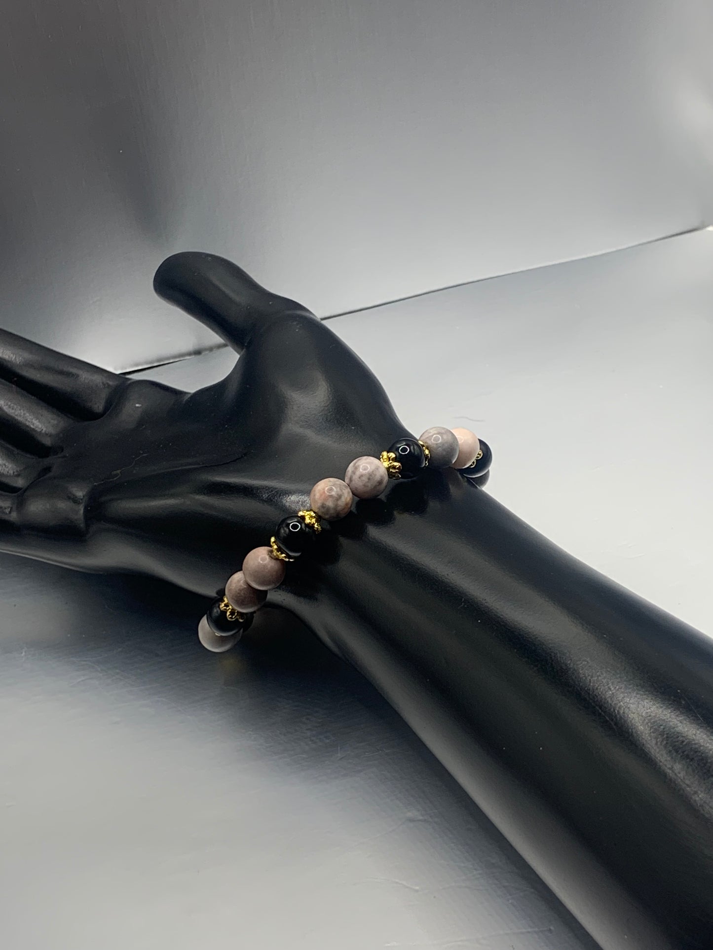 Black obsidian with pink zebra jasper semi precious stone/crystal beaded elastic bracelet with gold plated flower bead caps