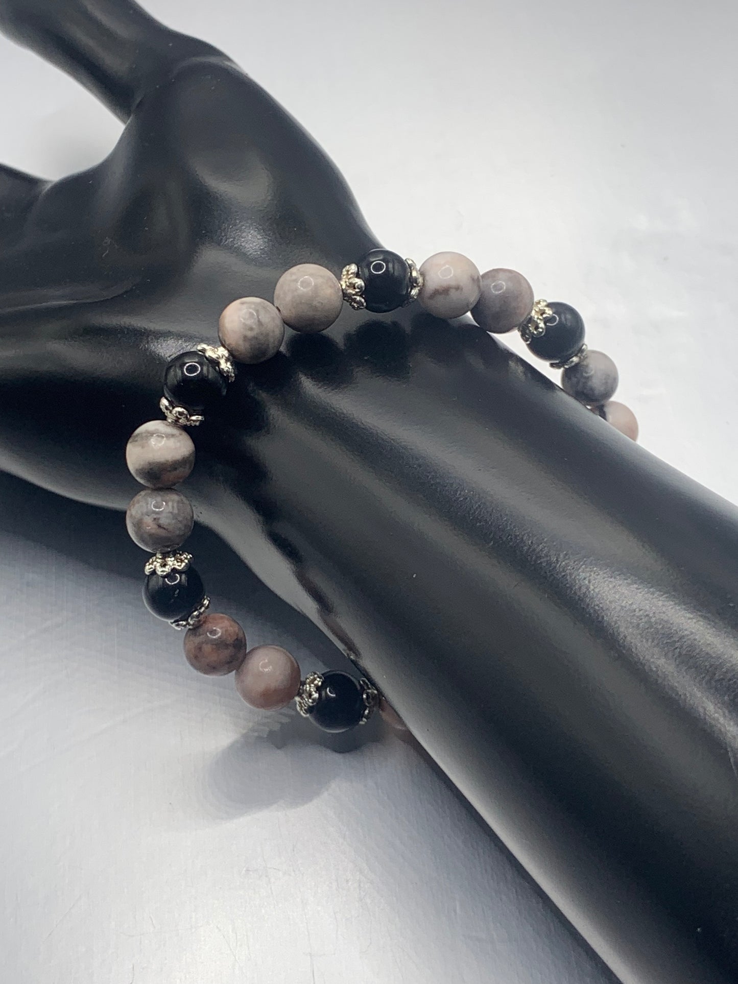 Black obsidian with pink zebra jasper semi precious stone/crystal beaded elastic bracelet with silver plated flower bead caps
