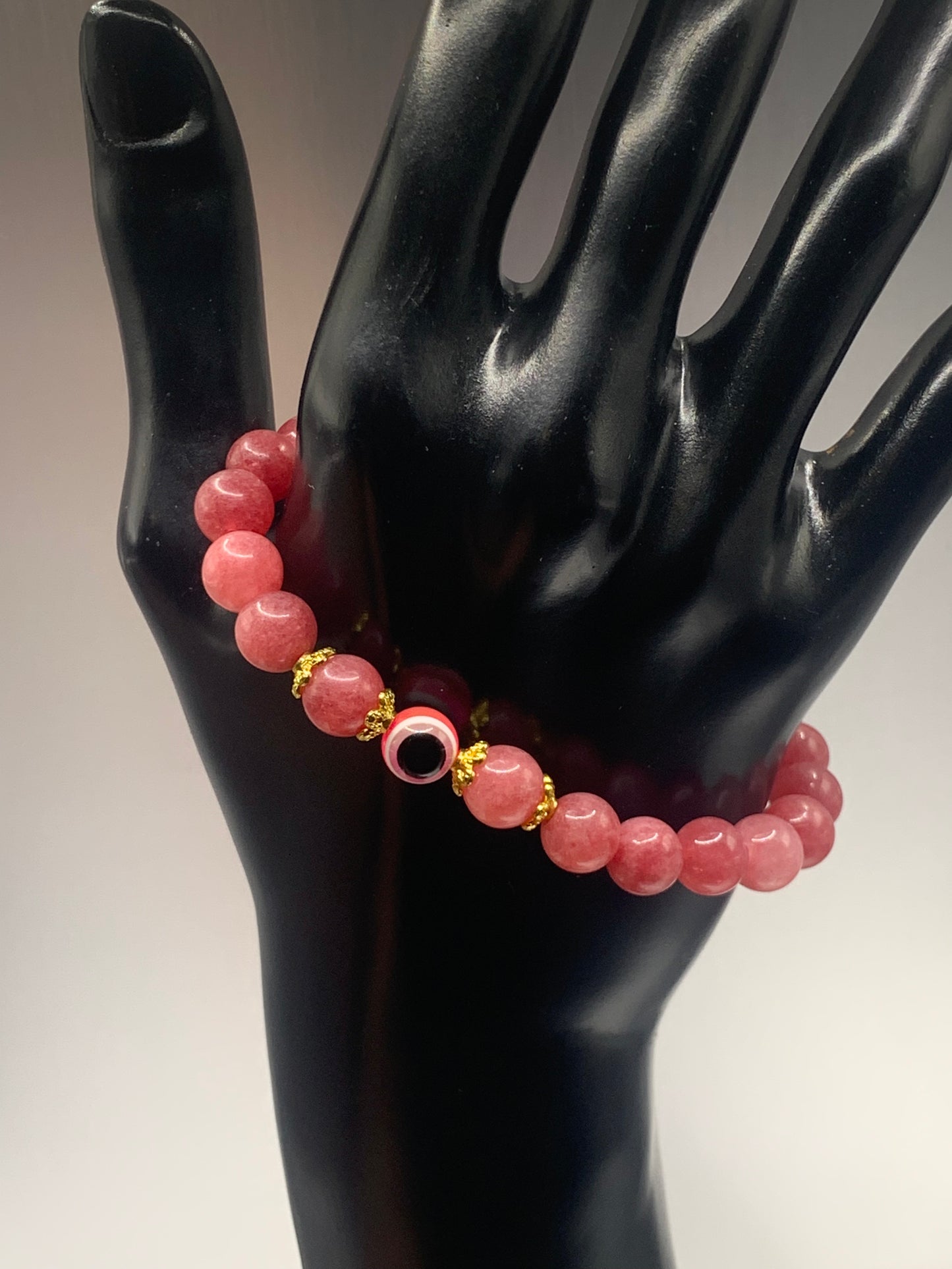 Pink chalcedony semi precious stone/crystal with resin evil eye beaded elastic bracelet