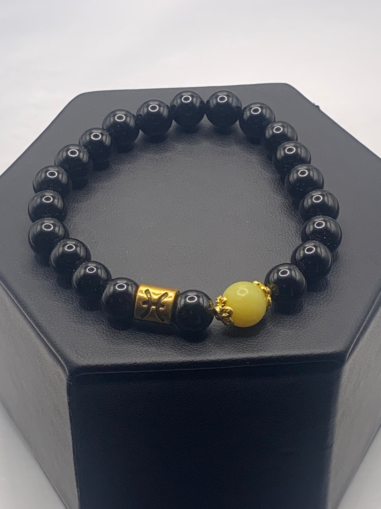 Pisces Zodiac black obsidian with yellow jade elastic beaded bracelet with gold accents