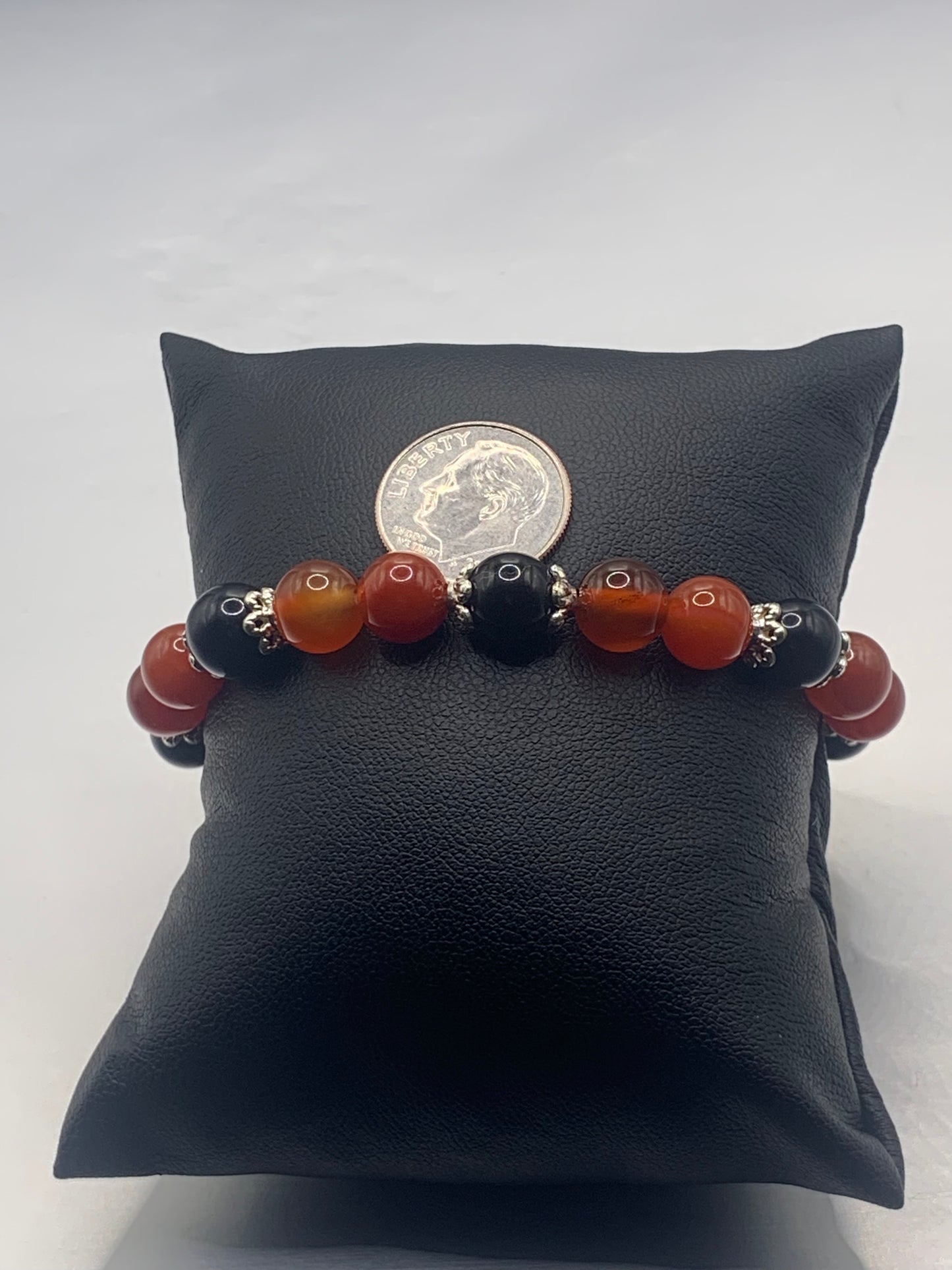 Black obsidian with red agate semi precious stone/crystal beaded elastic bracelet with silver plated flower bead caps