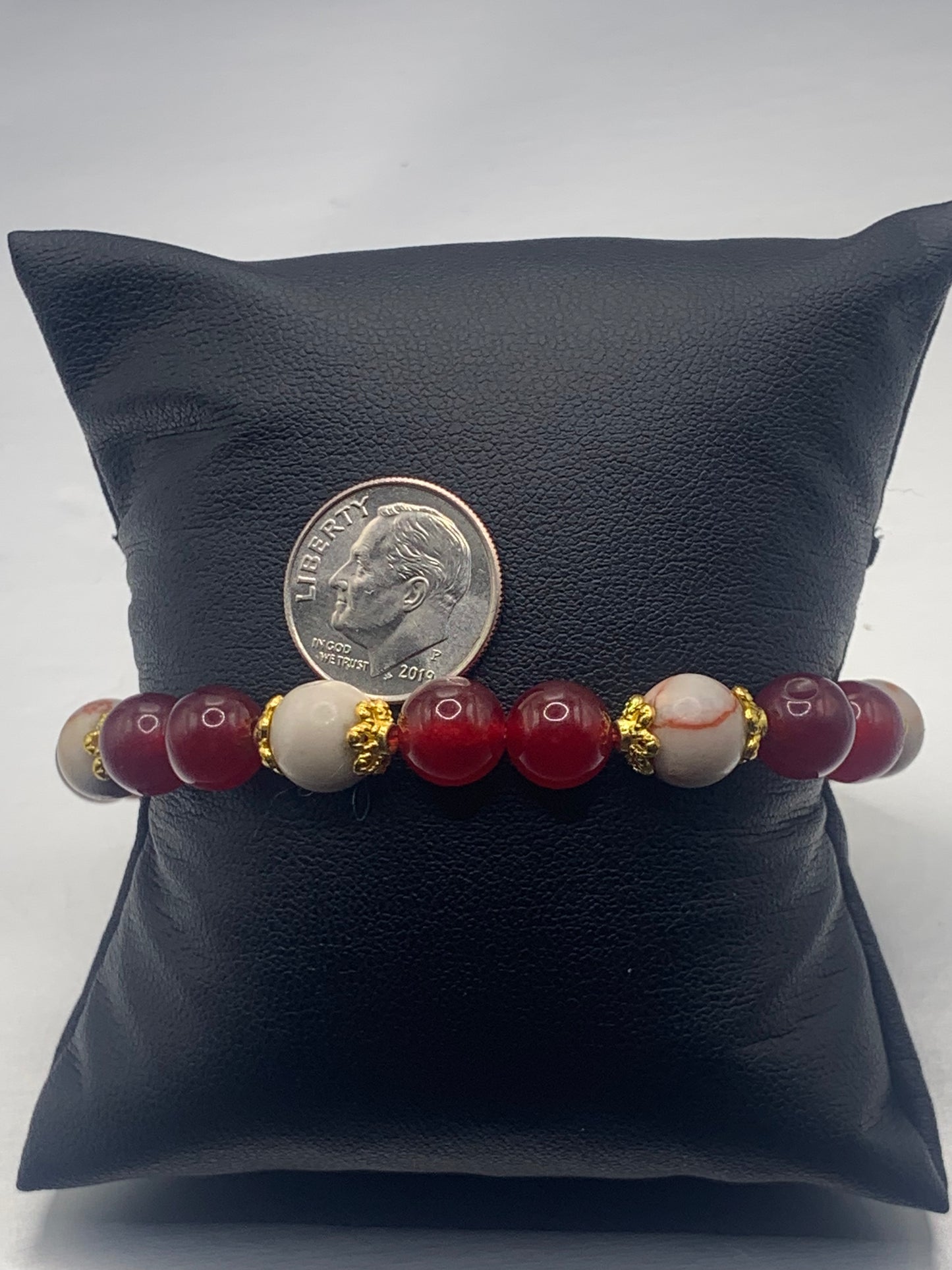 Red vein jasper and red chalcedony semi precious stone/crystal elastic beaded bracelet with gold plated flower bead caps