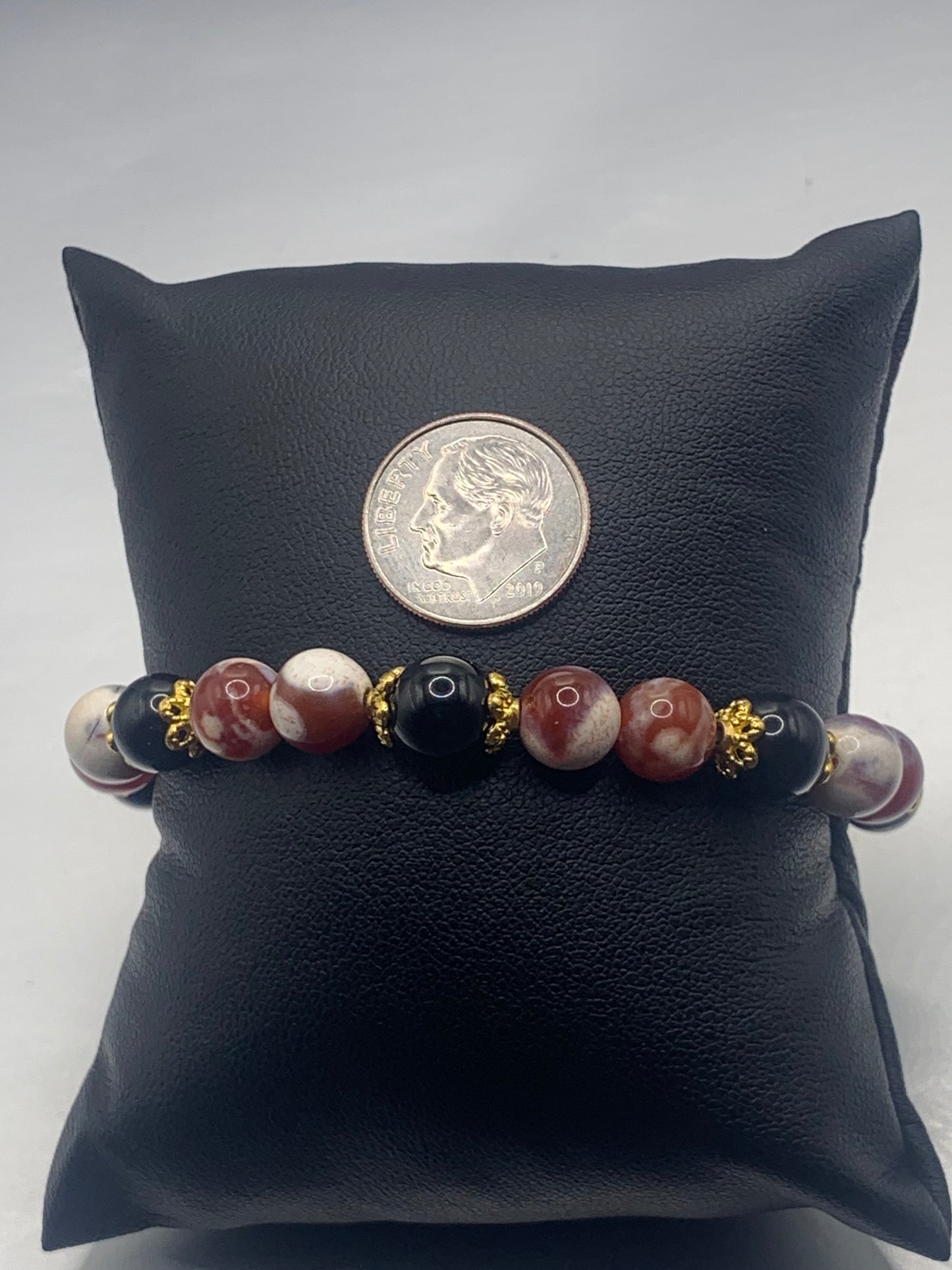 Black obsidian with red white orca agate semi precious stone/crystal beaded elastic bracelet with gold plated flower bead caps